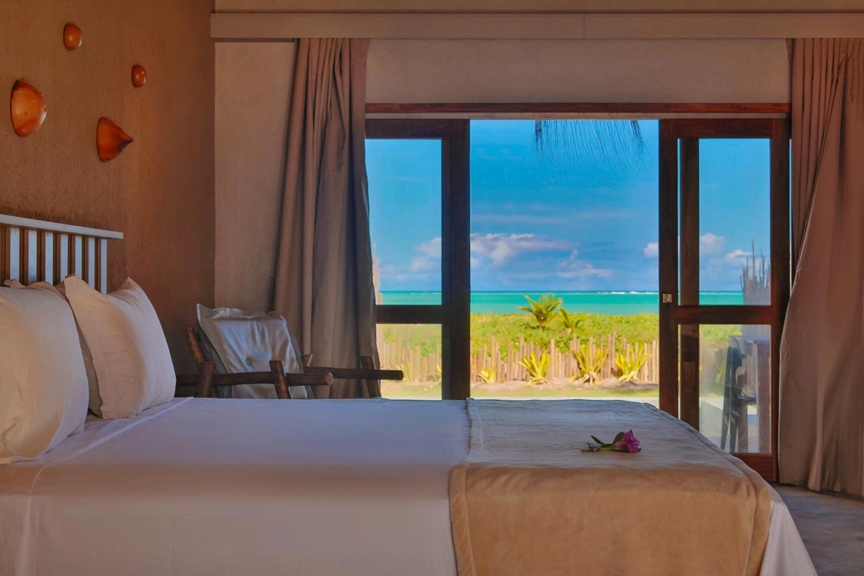 Bed in MONAN BOUTIQUE HOTEL