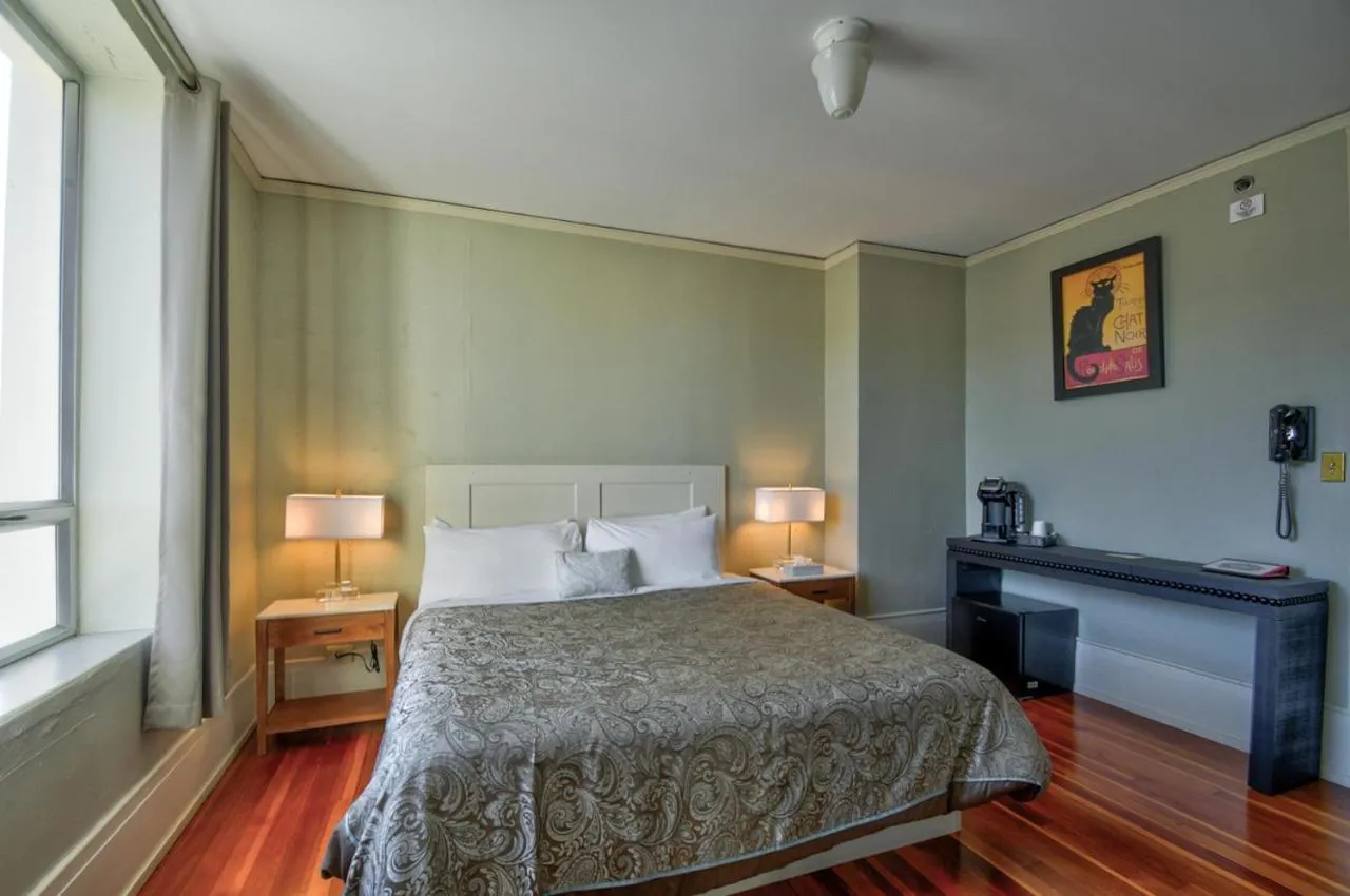 Bed in Centralia Square Grand Ballroom and Vintage Hotel