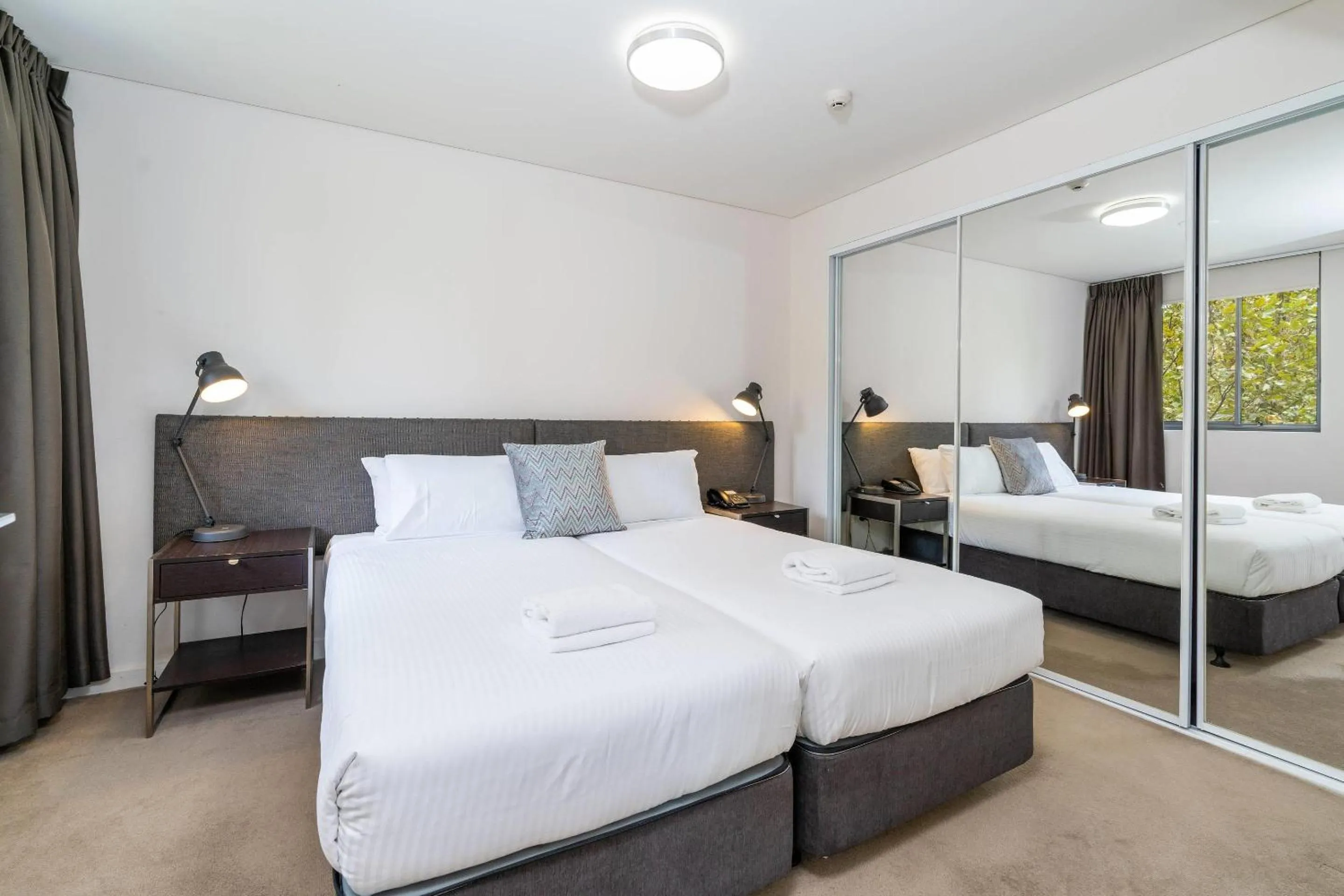 Bedroom, Bed in Terminus Apartment Hotel, an Ascend Collection Hotel