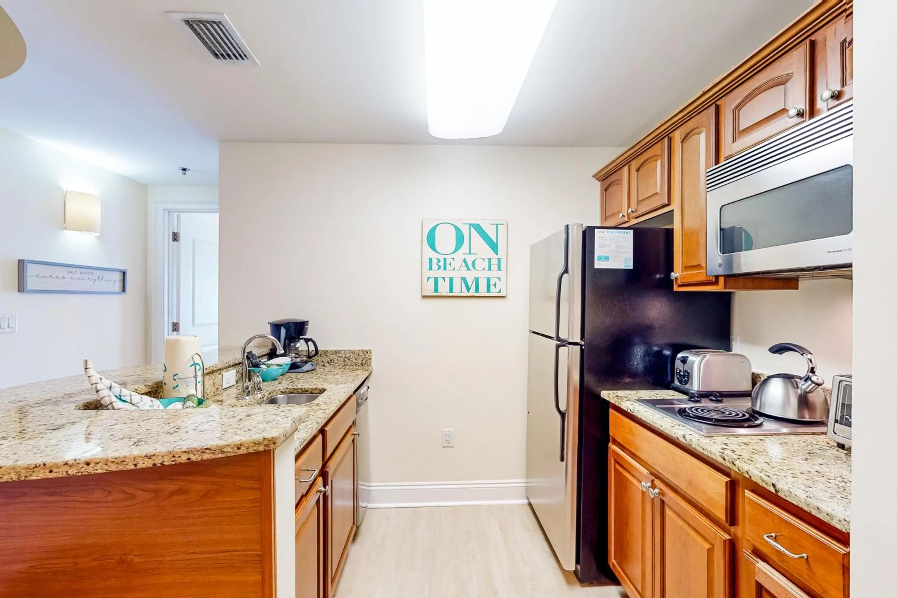 Kitchen/Kitchenette in Carillon Beach Inn 202