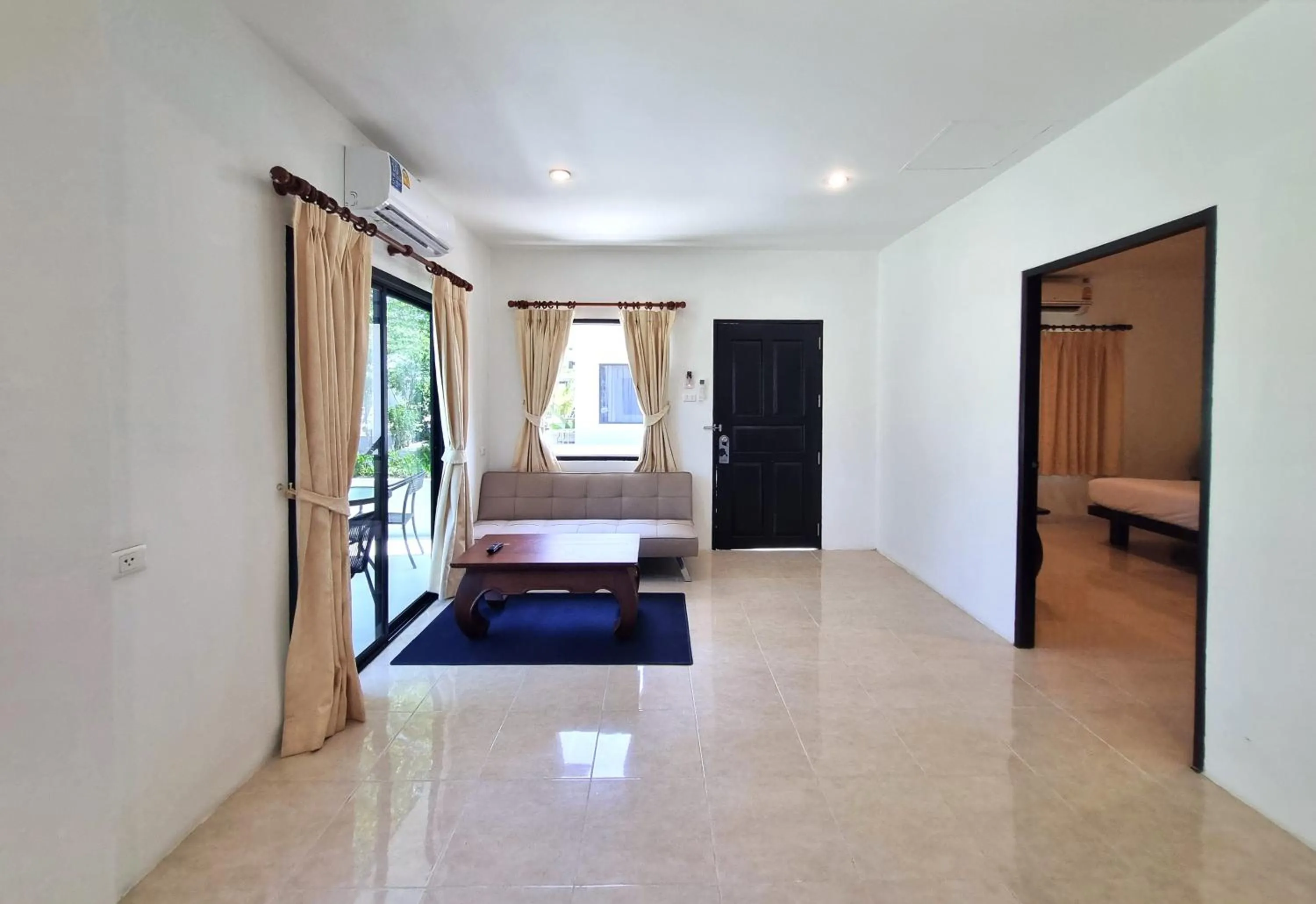 Living room, Bed in Isara Nai Yang resort