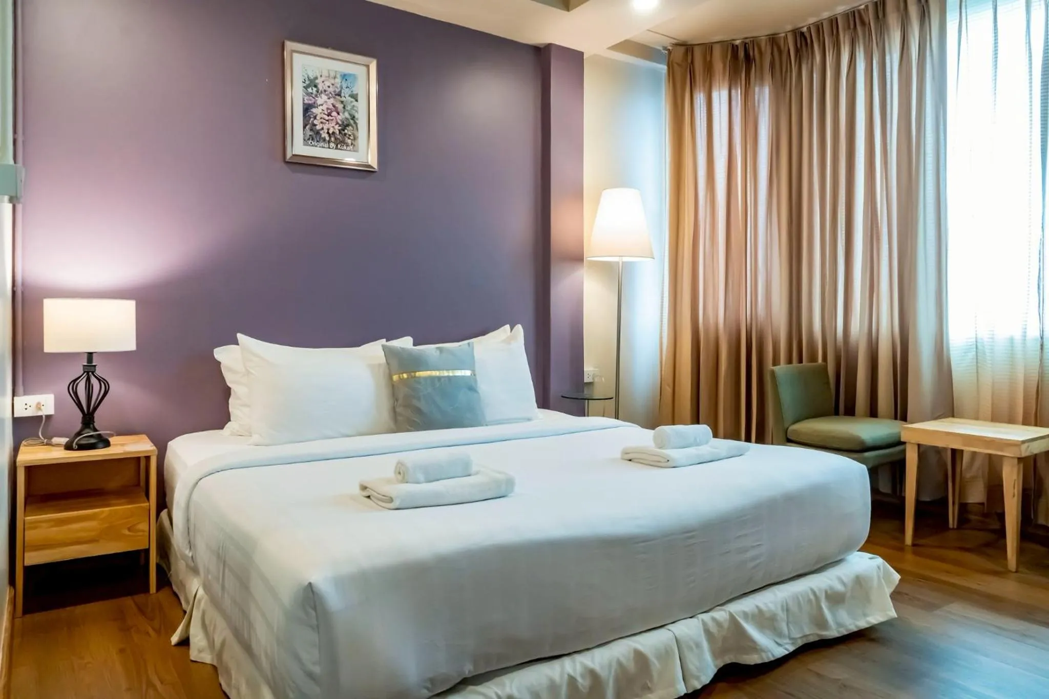 Photo of the whole room, Bed in Ployburi Boutique Hotel