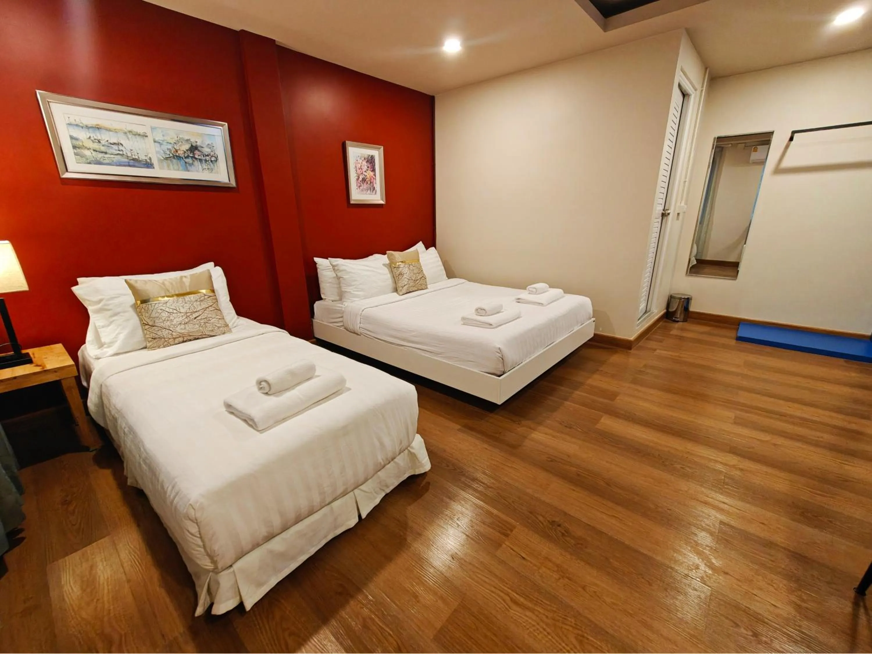 Bed in Ployburi Boutique Hotel