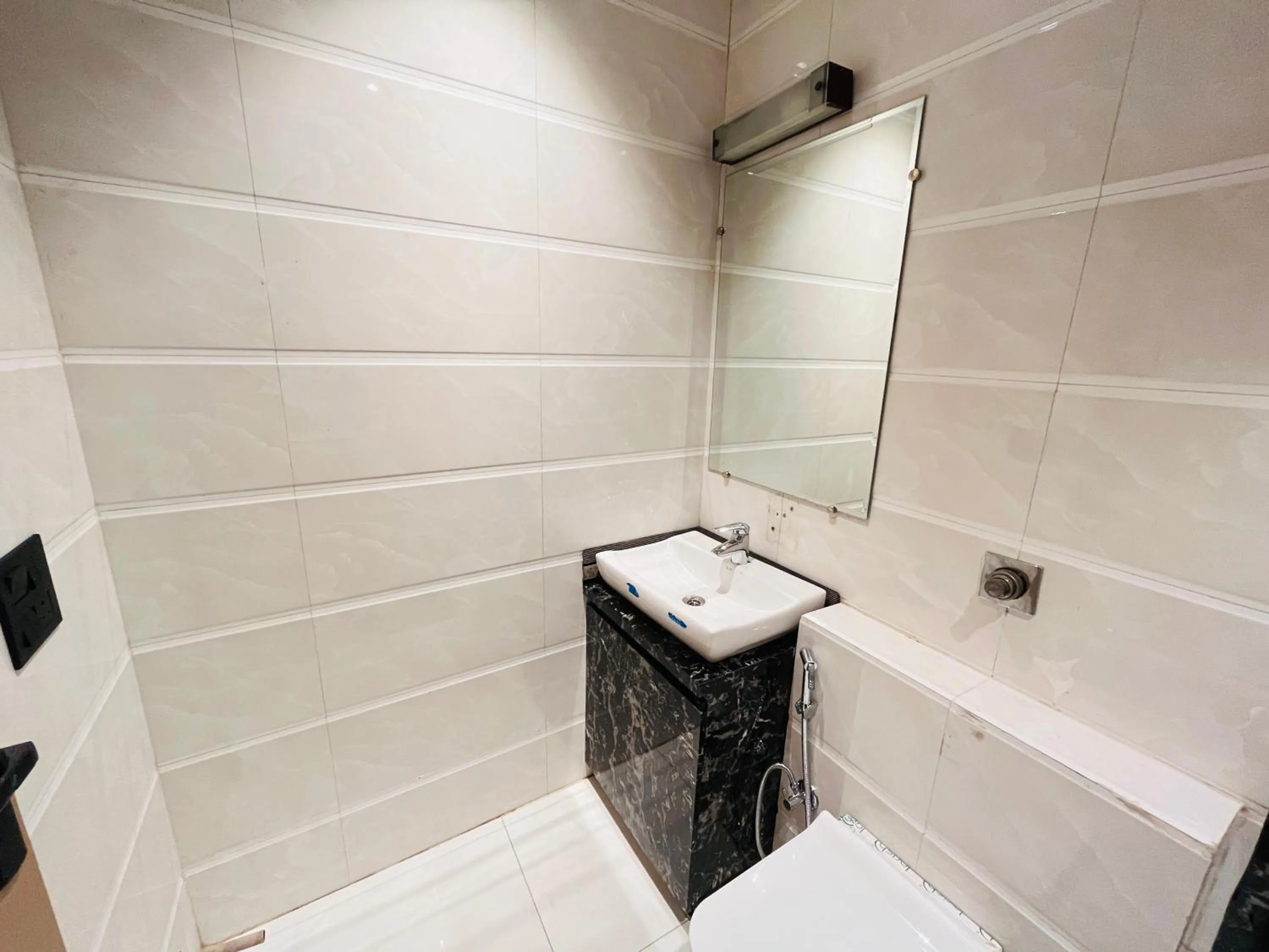 Shower in Hotel IP Swarn near Anand Vihar Vaishali Ghaziabad