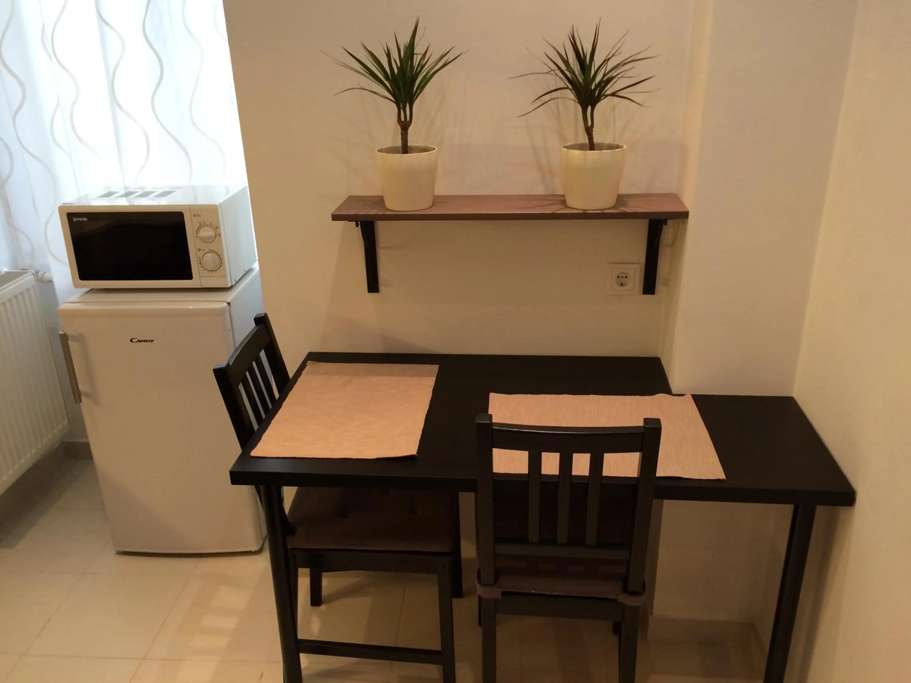 Kitchen or kitchenette in Central King Apartment