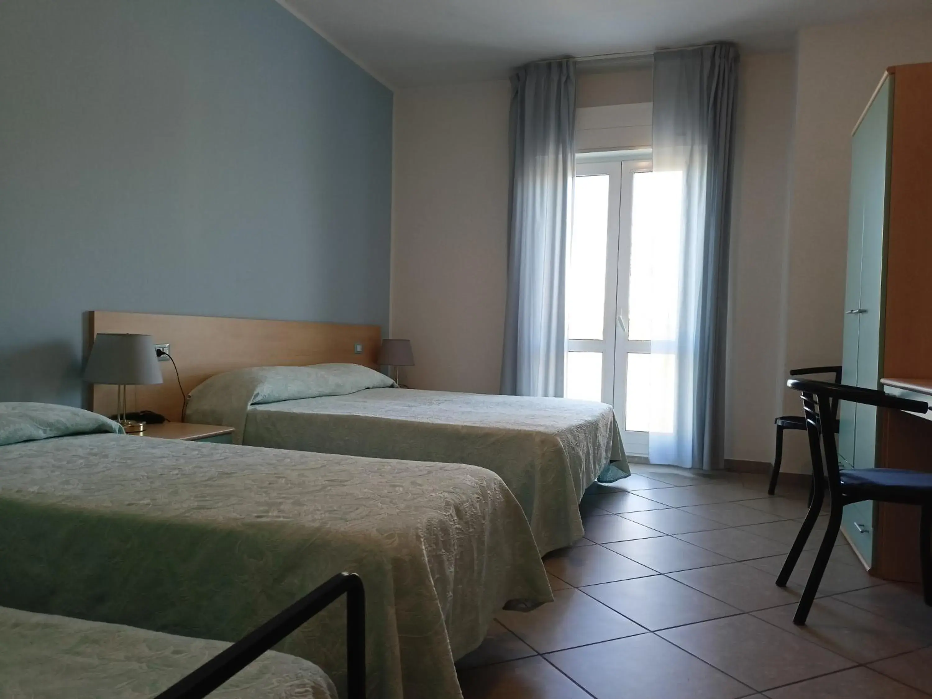 Quadruple Room with Balcony in Hotel Ariston Imperial Quadruple Room with Balcony in Hotel Ariston Imperial