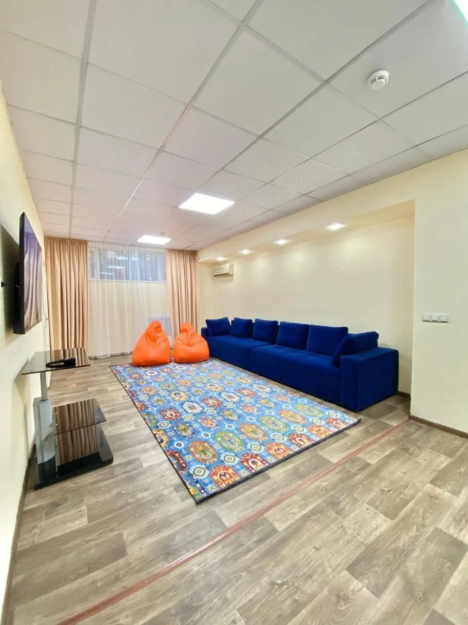 Communal lounge/ TV room, Bed in Alma-Ata Hostel