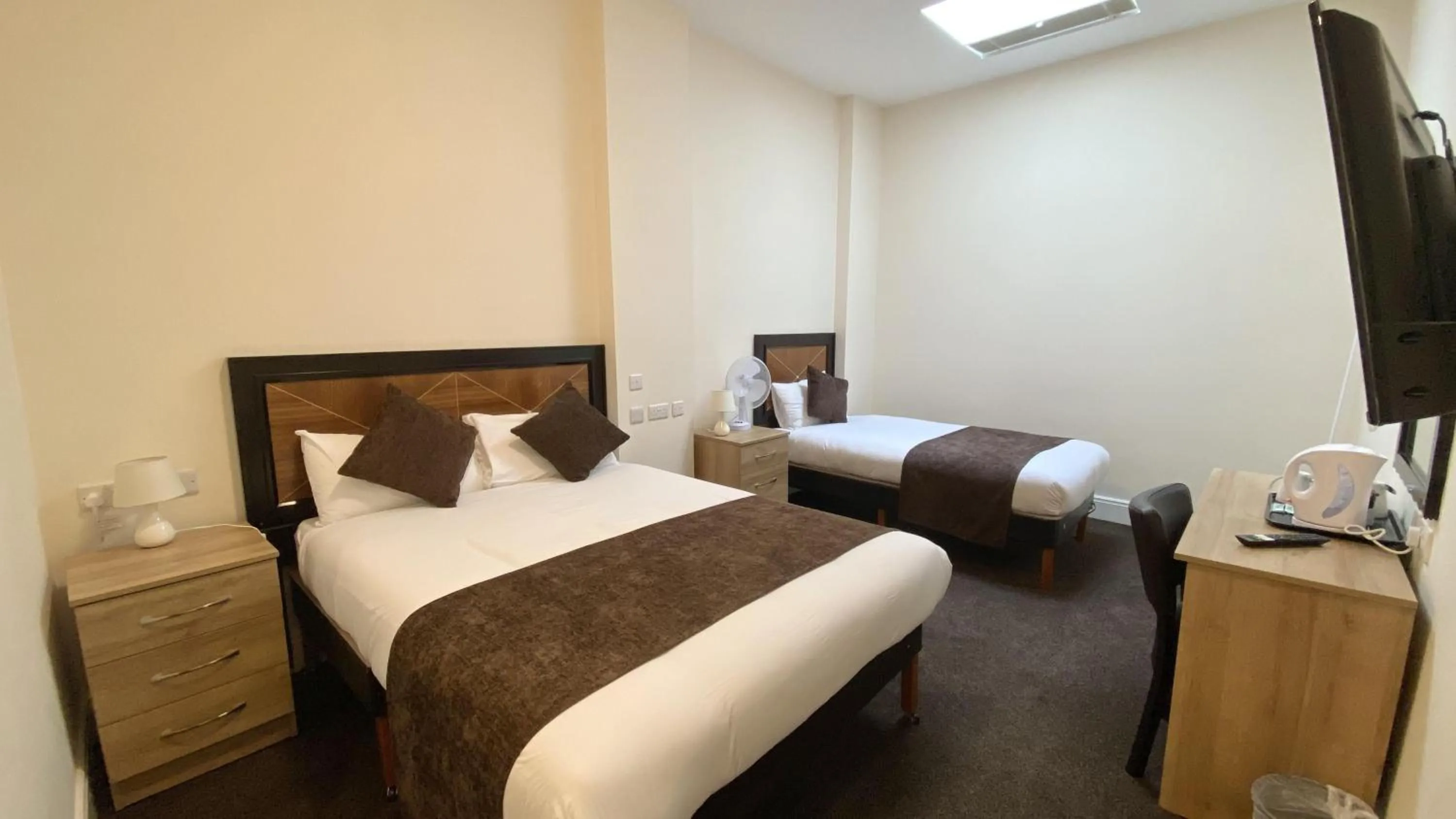 Bed in Russ Hill Hotel