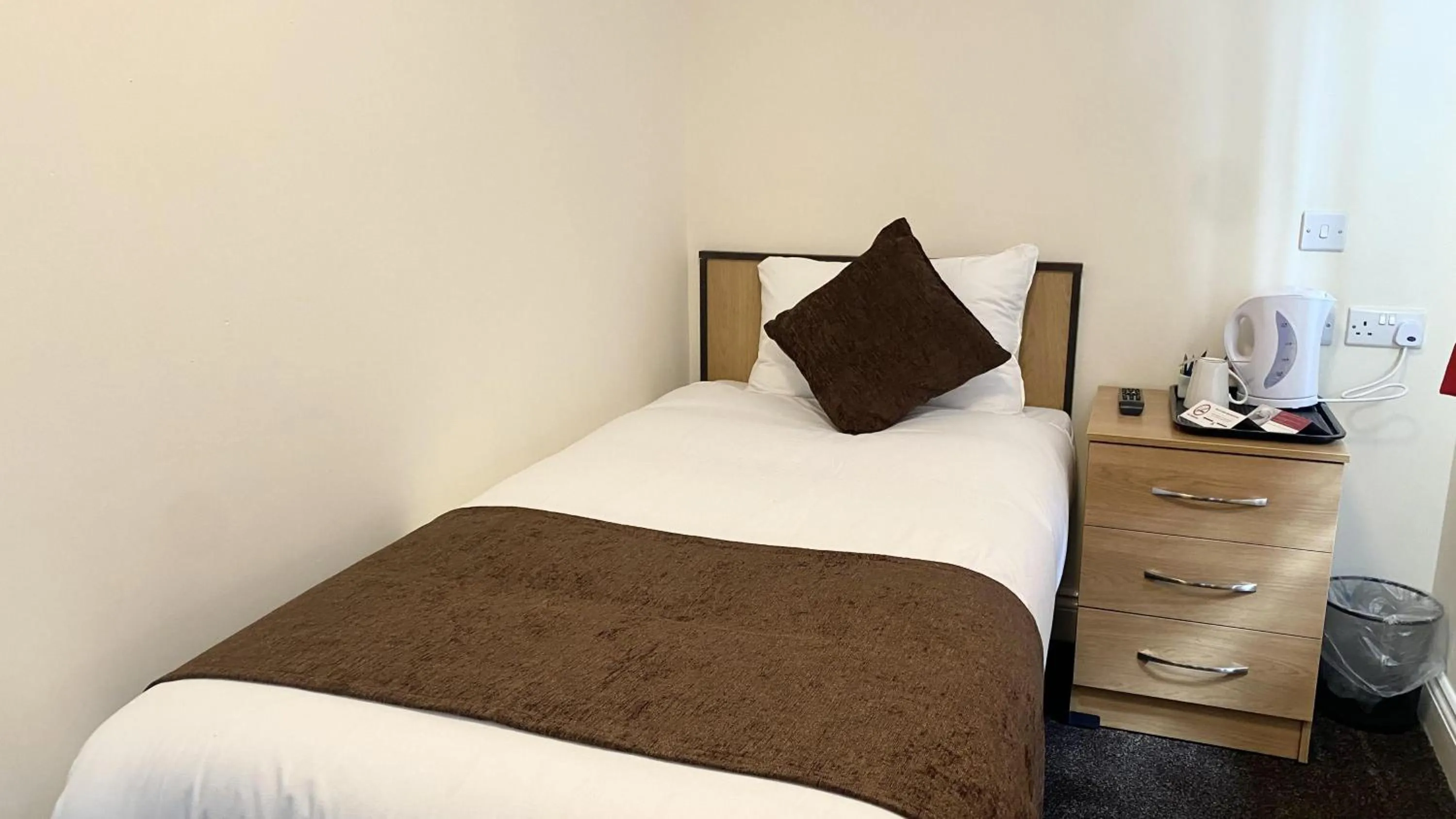 Bed in Russ Hill Hotel