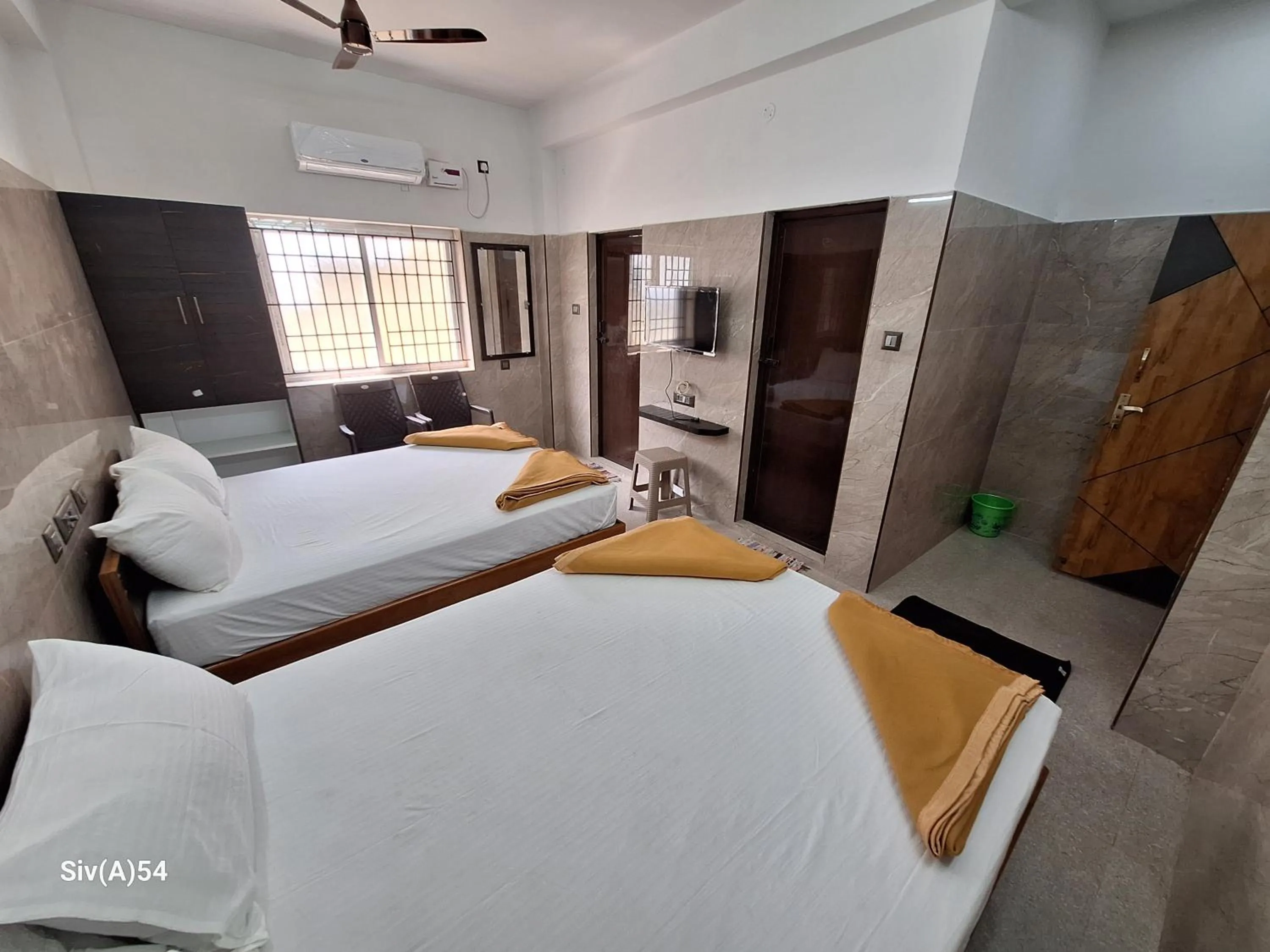 Shower, Bed in Viruksham Residency
