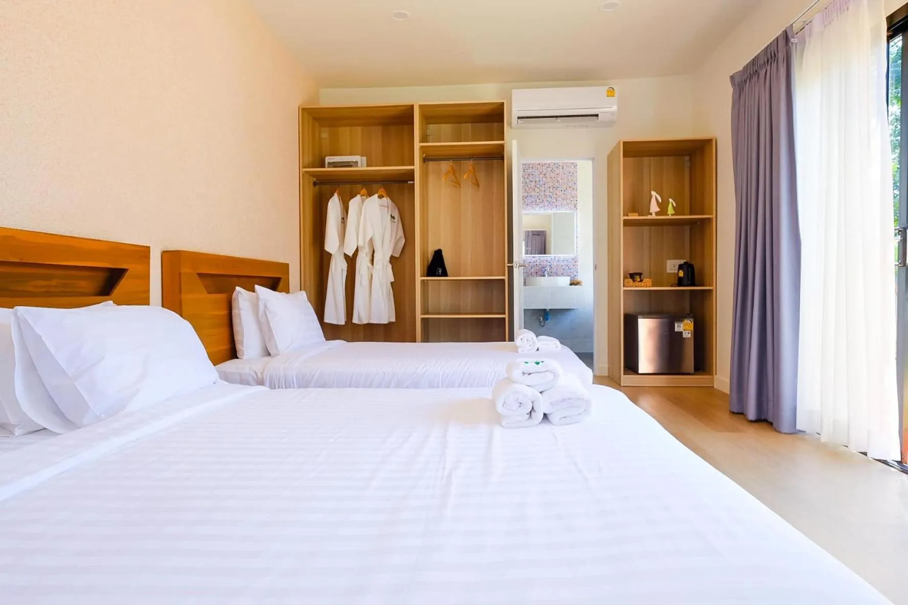 Photo of the whole room, Bed in Rakmak Kan Resort & Cafe