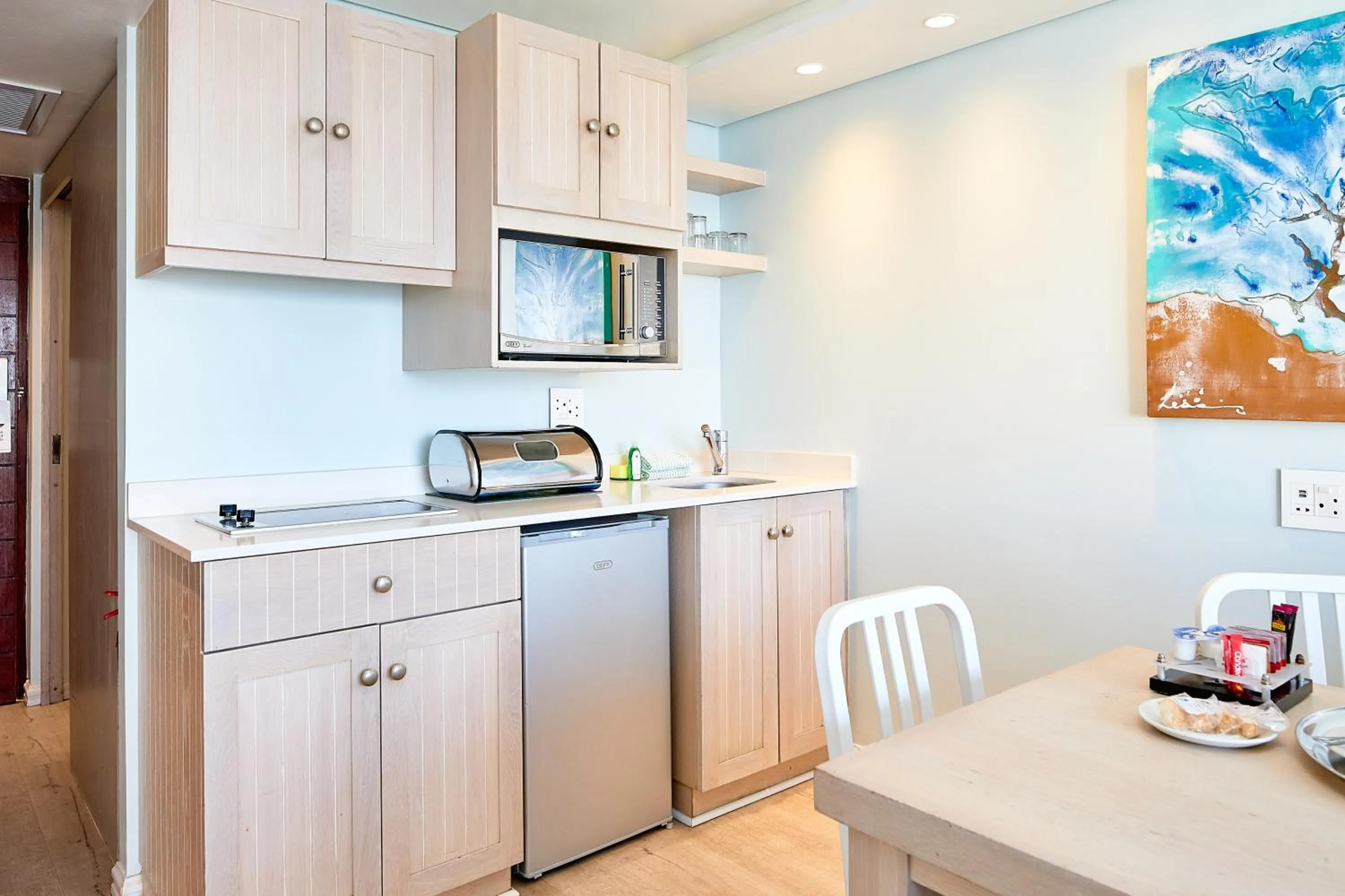 Kitchen or kitchenette in First Group La Montagne