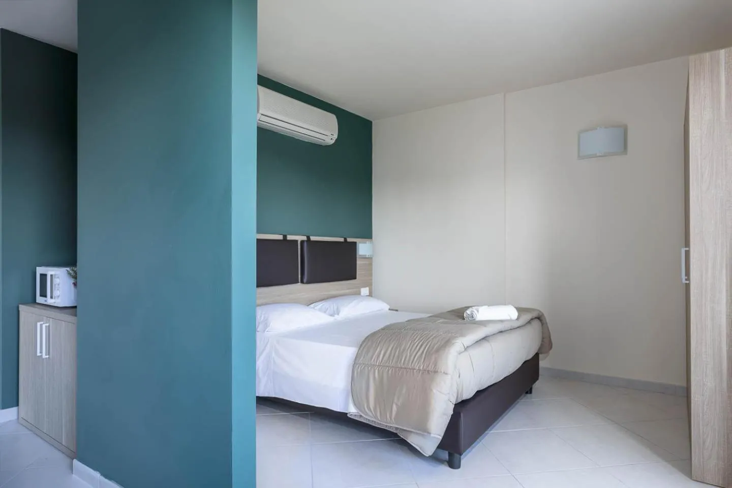 Bed in Tuscasì Aparthotel