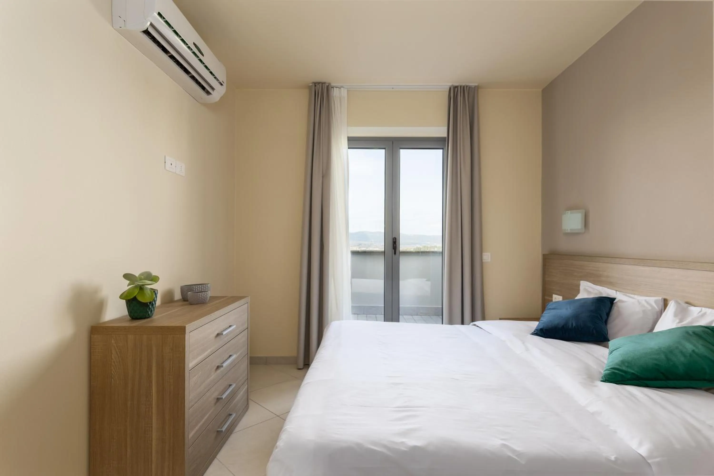 Bed in Tuscasì Aparthotel