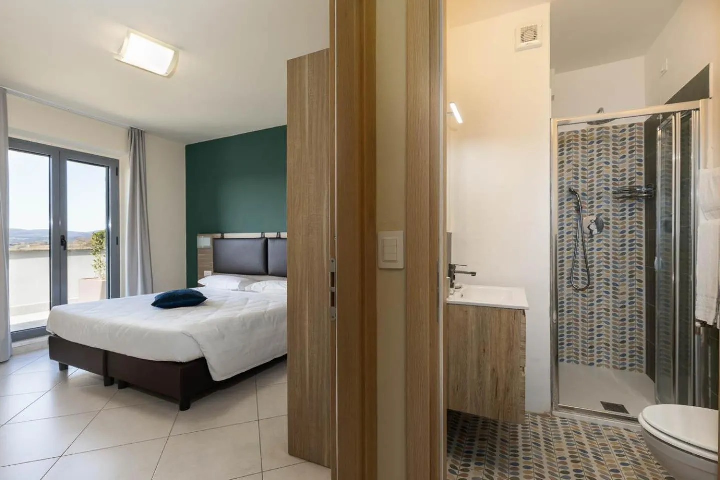 Bed in Tuscasì Aparthotel