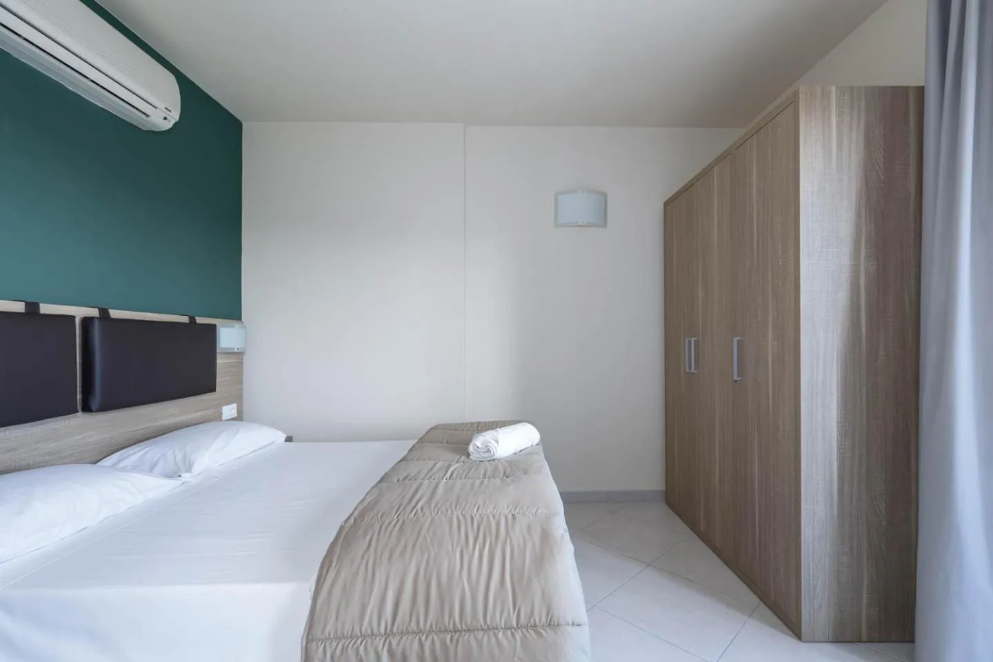 Bed in Tuscasì Aparthotel