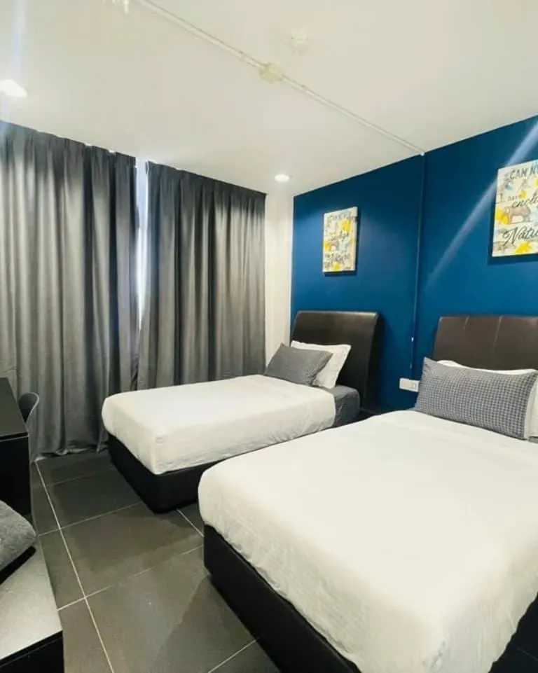 Bed in Halo Rooms Hotel