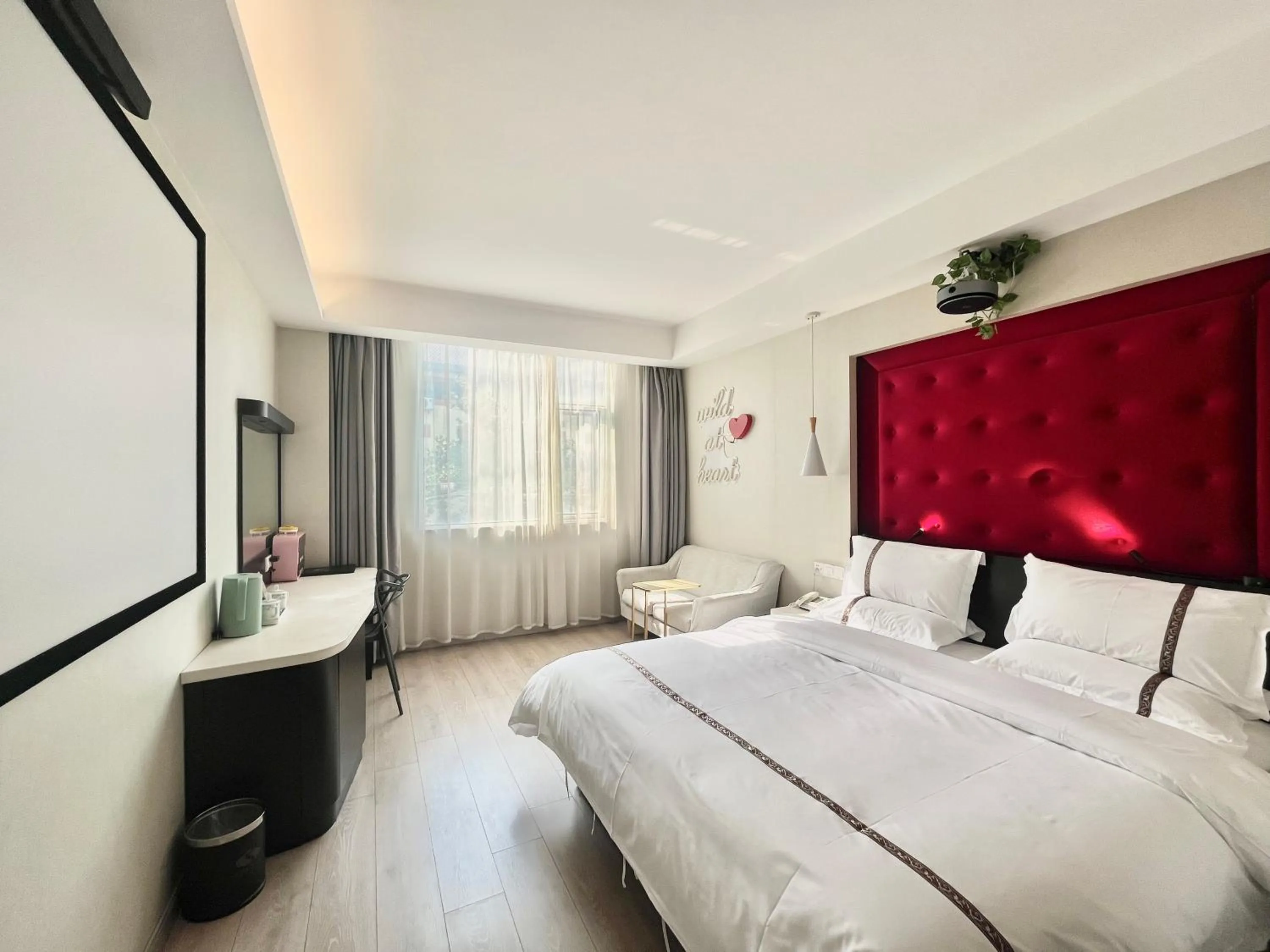 Communal lounge/ TV room, Bed in Tianshui Times Hotel Zhangjiagang