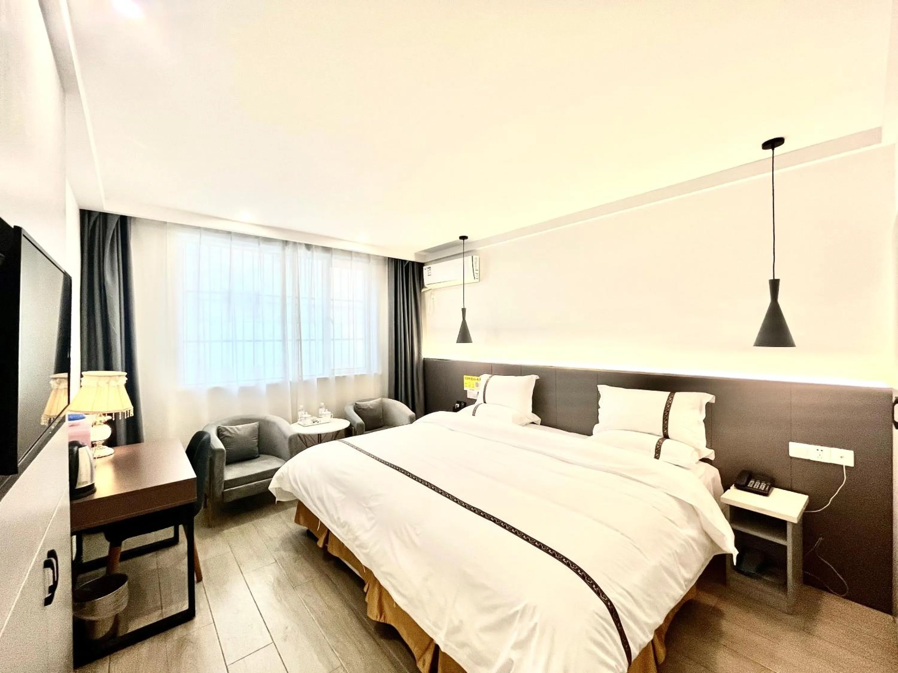 Bed in Tianshui Times Hotel Zhangjiagang