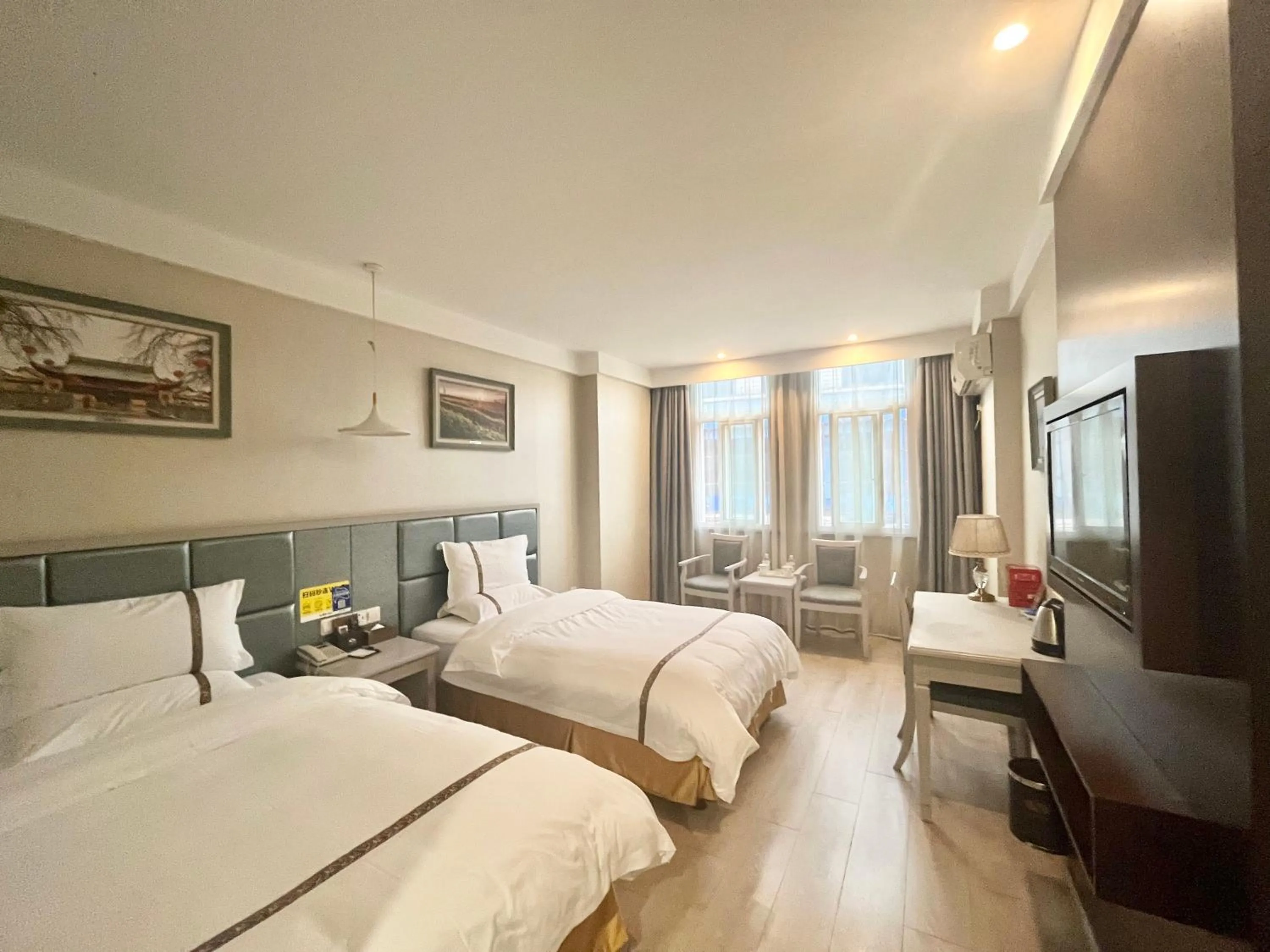 Bed in Tianshui Times Hotel Zhangjiagang