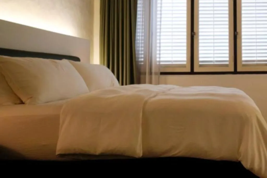 Bed in Quint Residence, Georgetown - Rustic Heritage Guesthouse by ALV