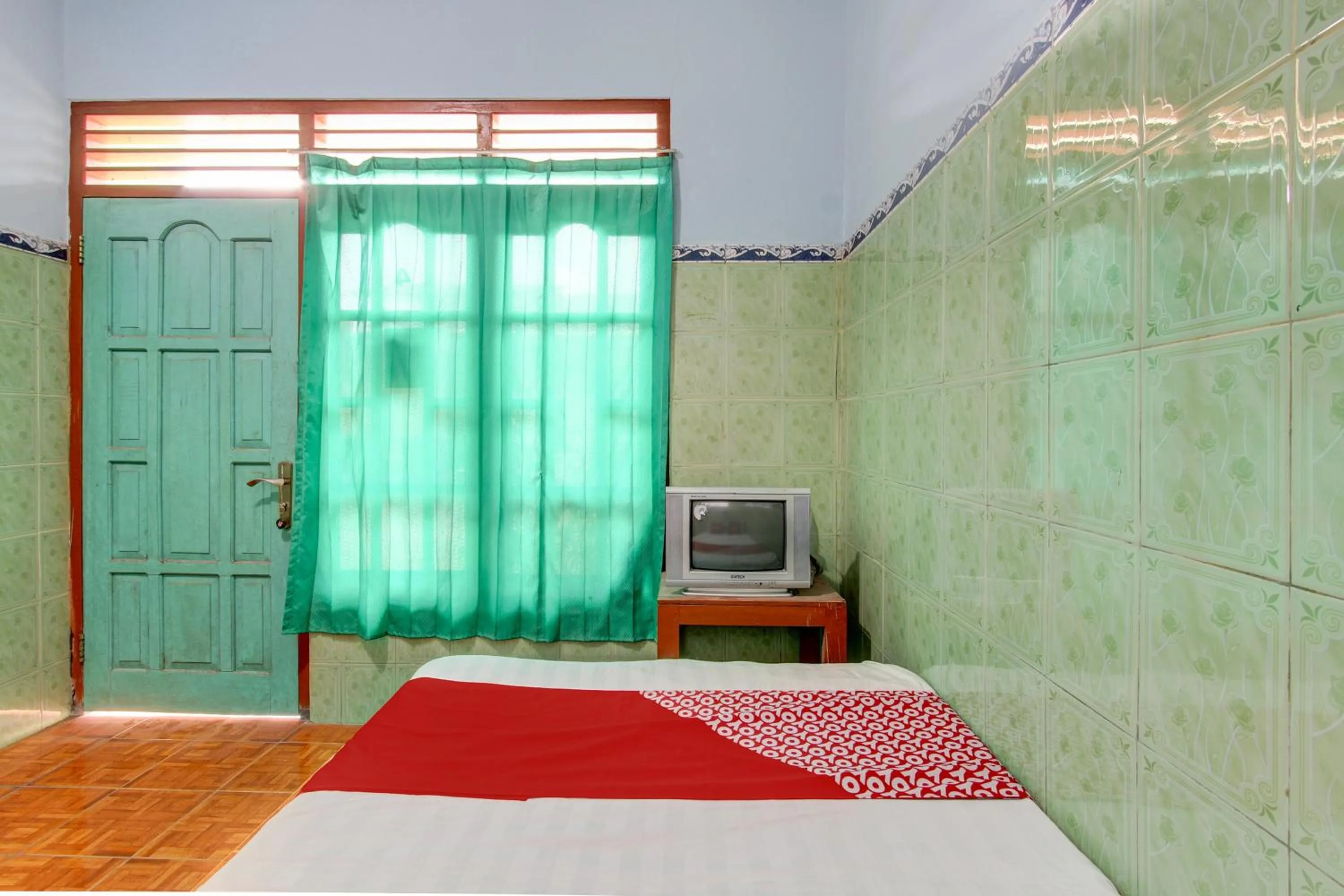 Bedroom, Bed in Hotel O Pondok Wisata Kurniawan 2NearWonogondang Camp ( Bumi Perkemahan Wonogondang )