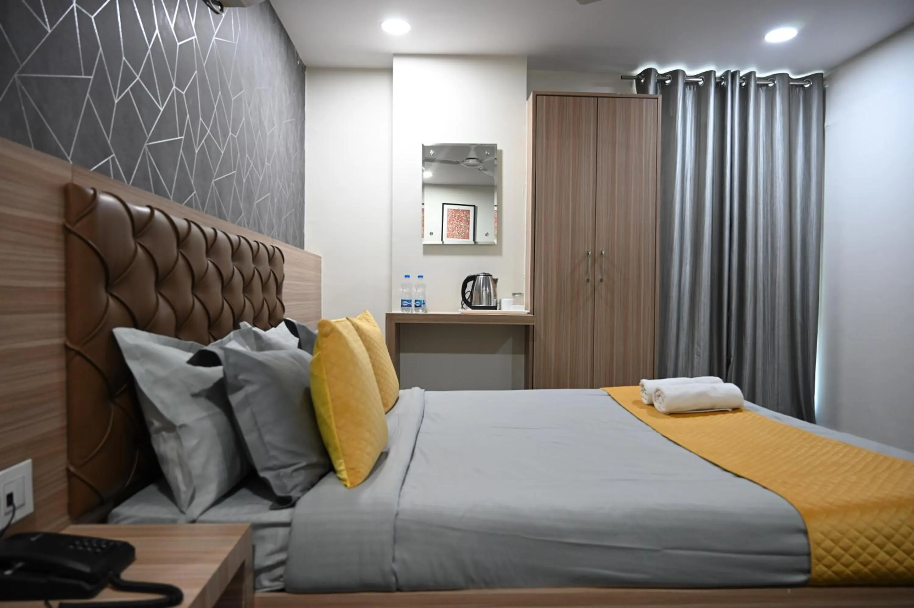 Bed in Hotel Supraja Yellow Bells