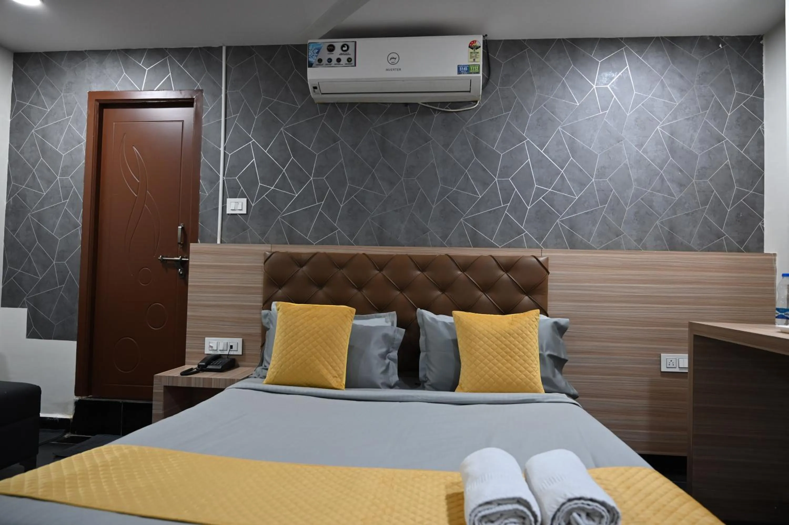 Bed in Hotel Supraja Yellow Bells