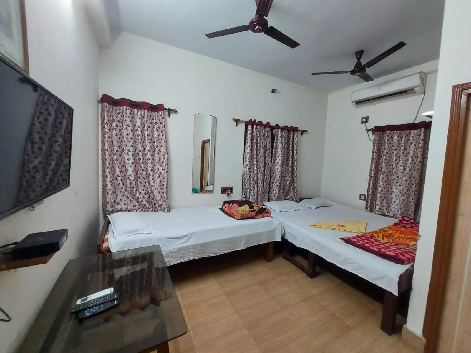 Bedroom, Bed in Rajlaxmi Resort - Pure Veg