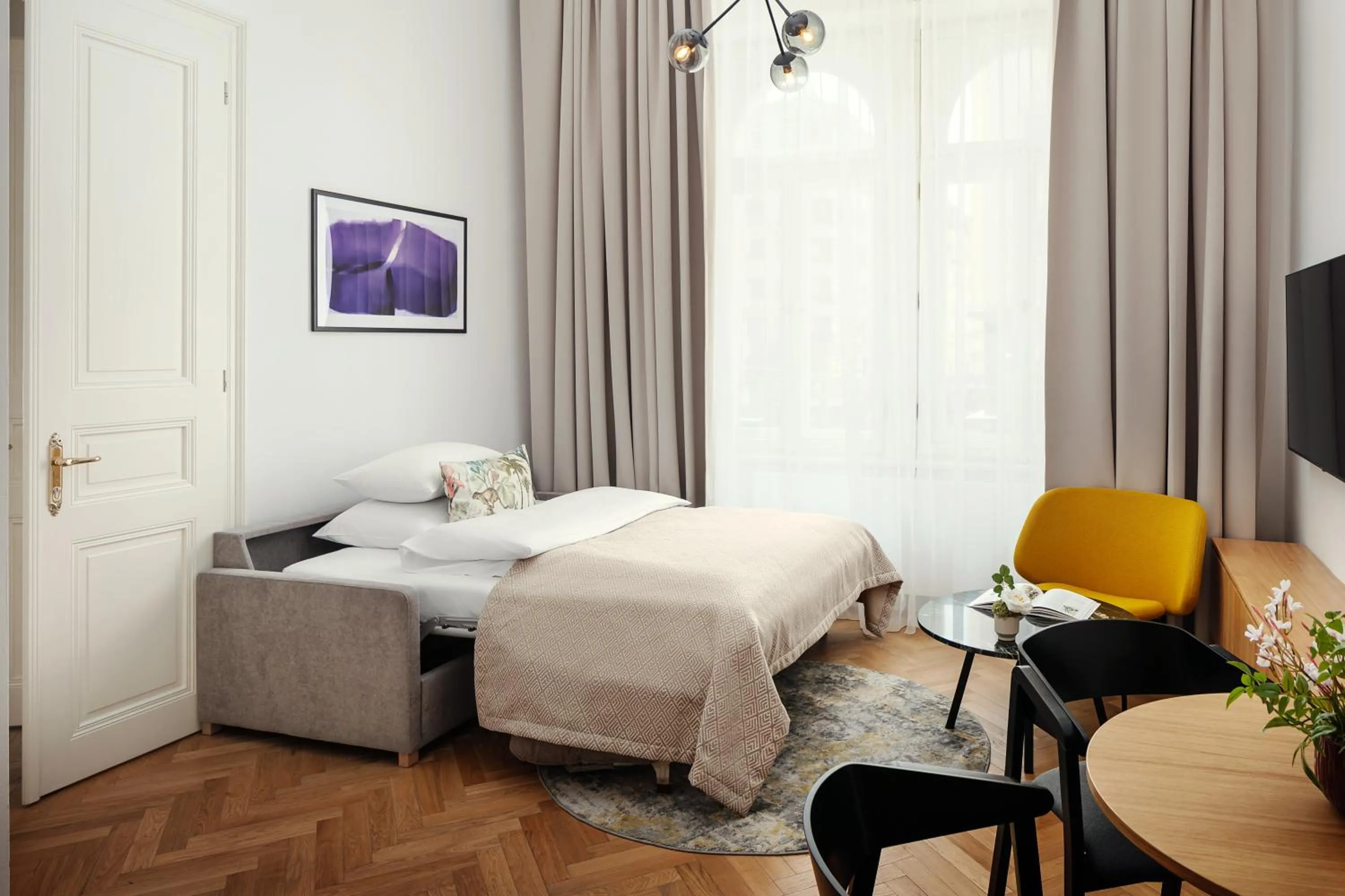 Living room, Bed in R16 Residences Prague