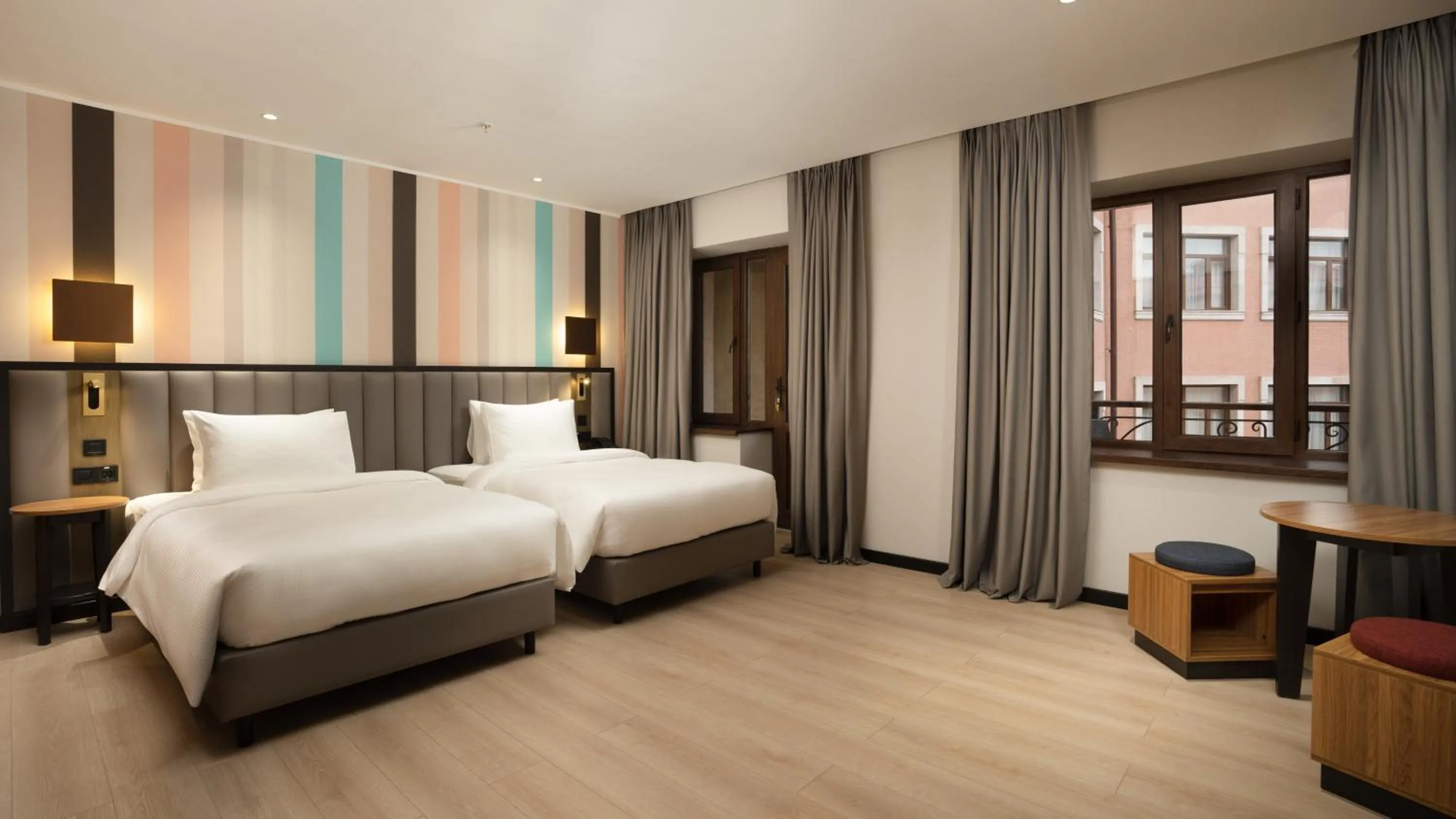 Bed in Ramada Encore by Wyndham Tashkent