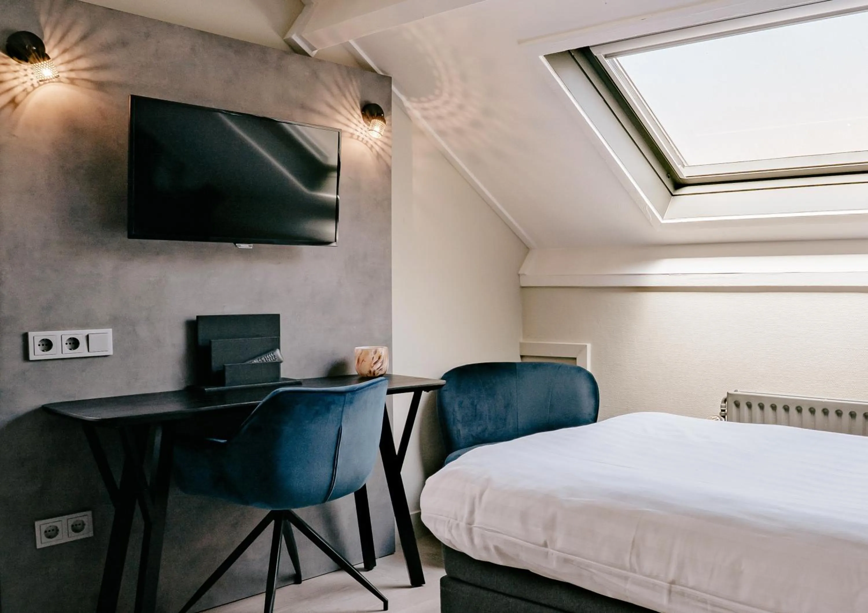 Living room, Bed in Hotel Heemskerk