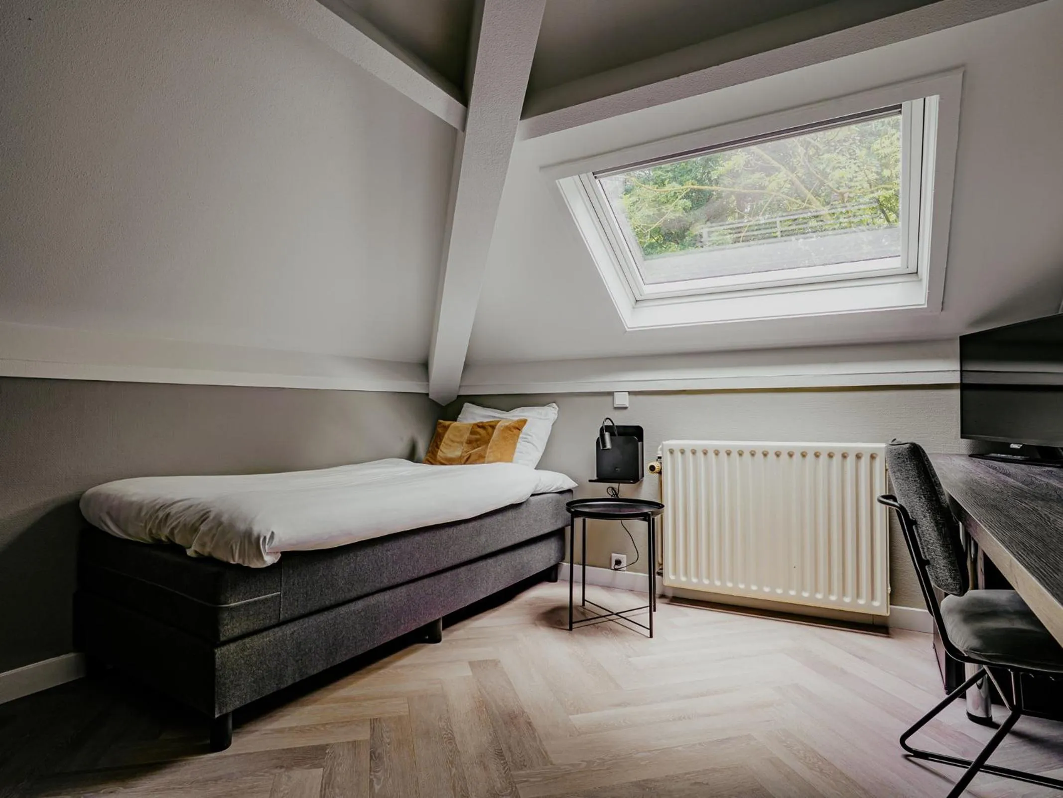 Bed in Hotel Heemskerk