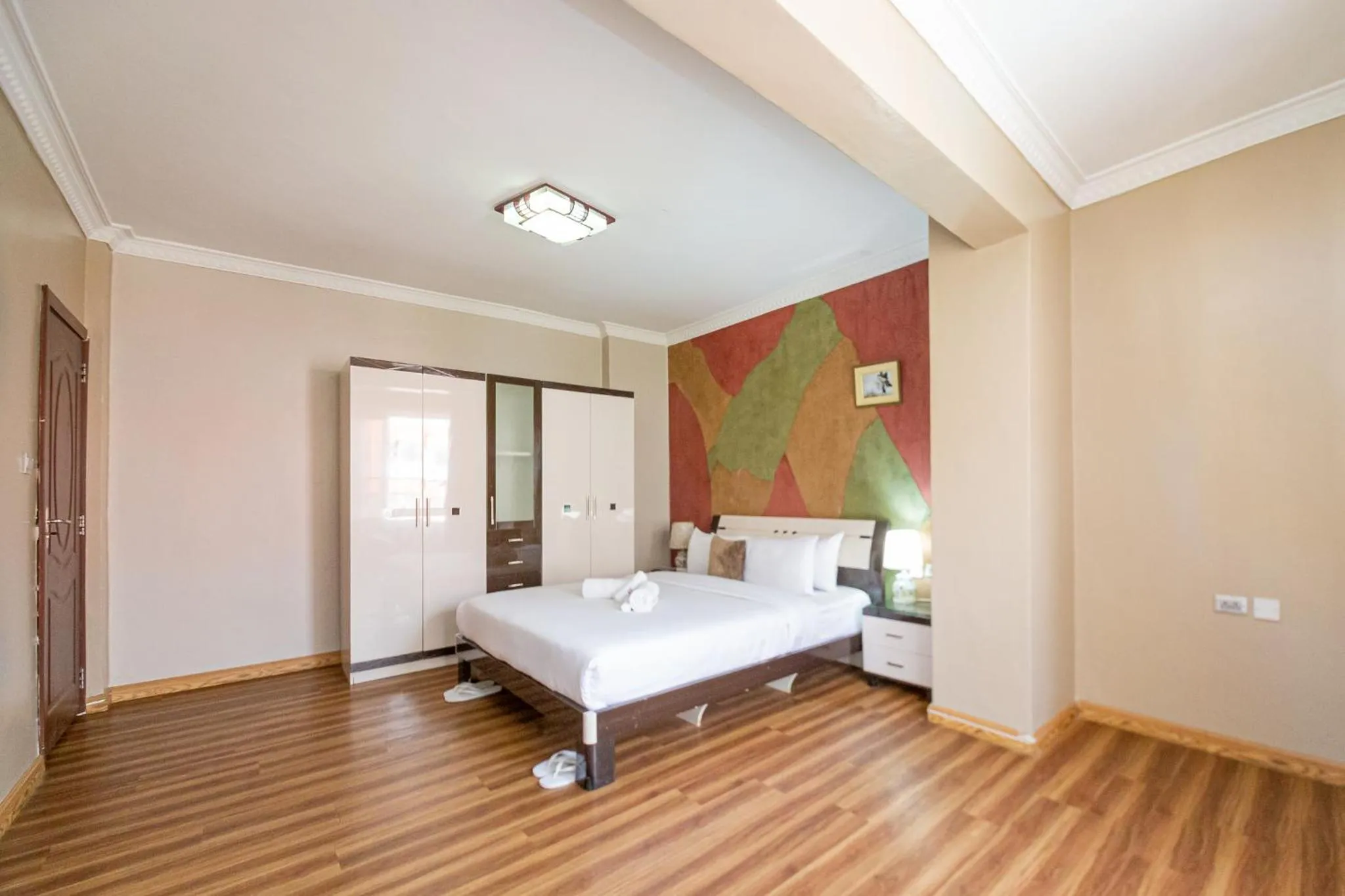 Bed in Eldon Apartments & Suites