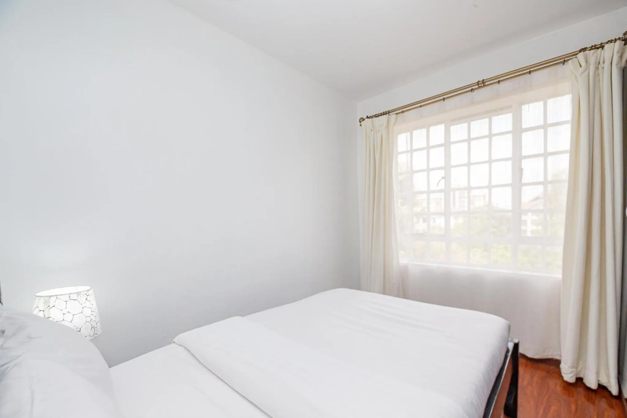 Bed in Eldon Apartments & Suites