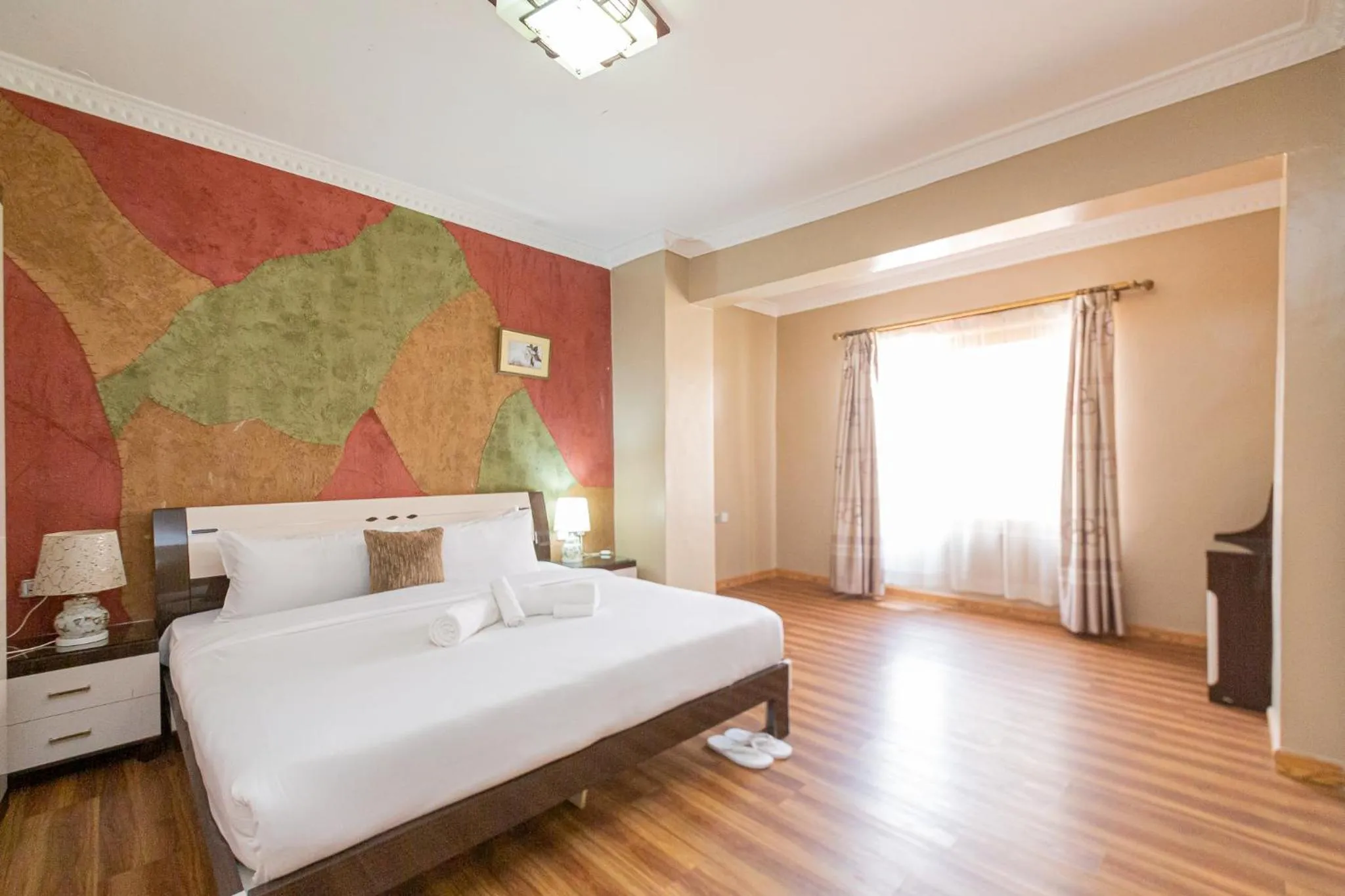 Bed in Eldon Apartments & Suites