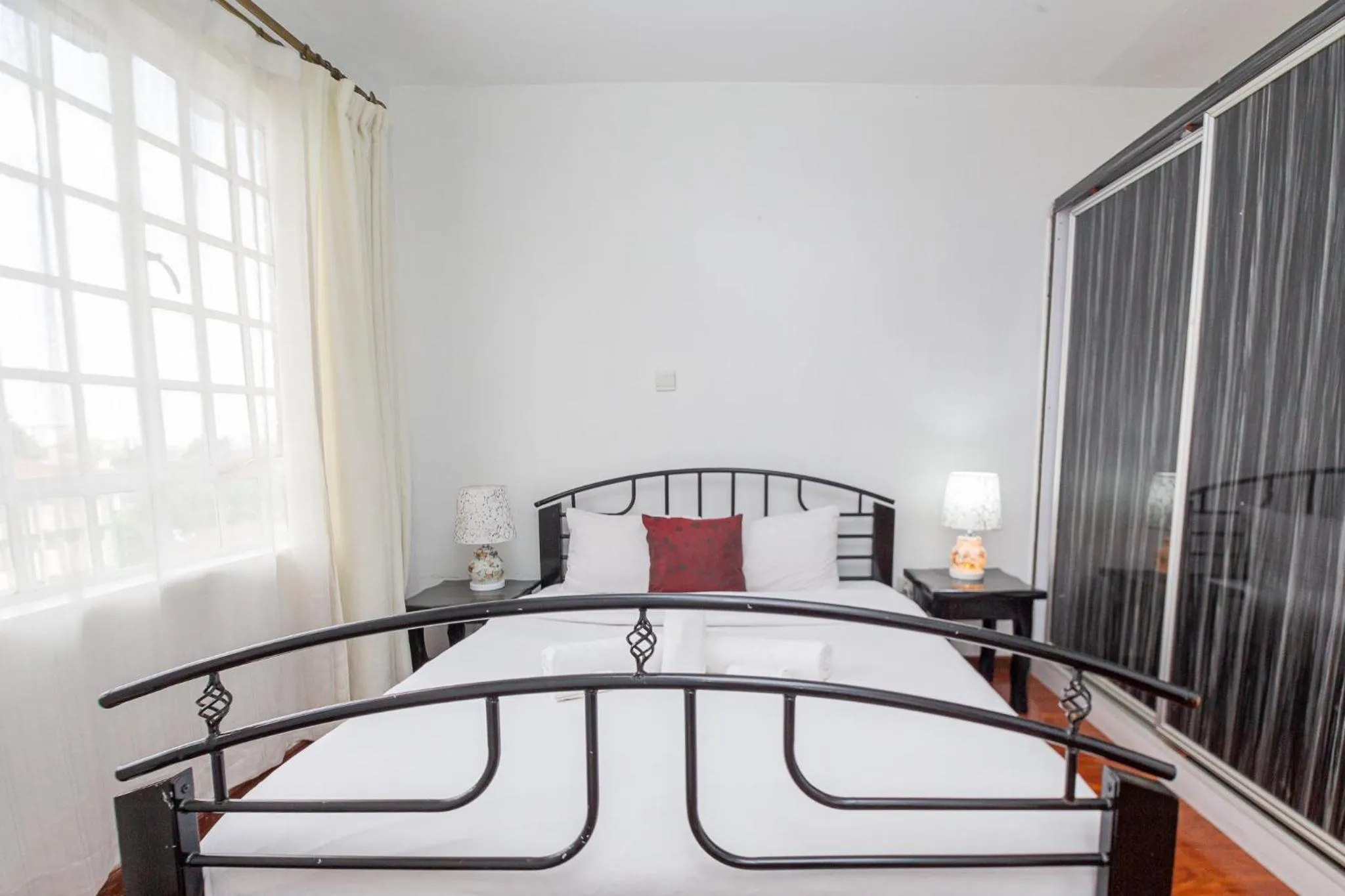 Bed in Eldon Apartments & Suites