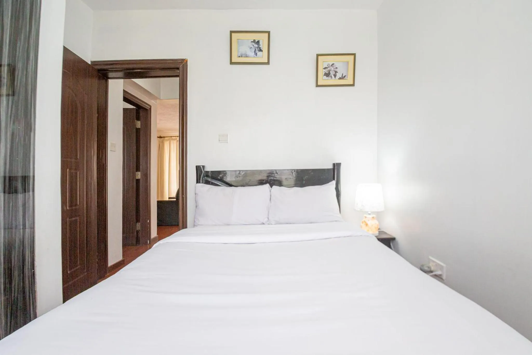 Bed in Eldon Apartments & Suites