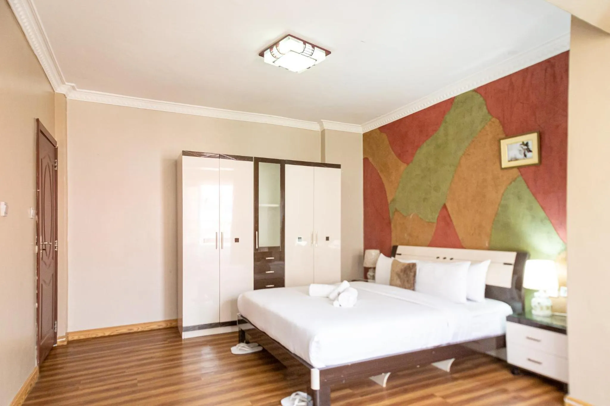 Bed in Eldon Apartments & Suites