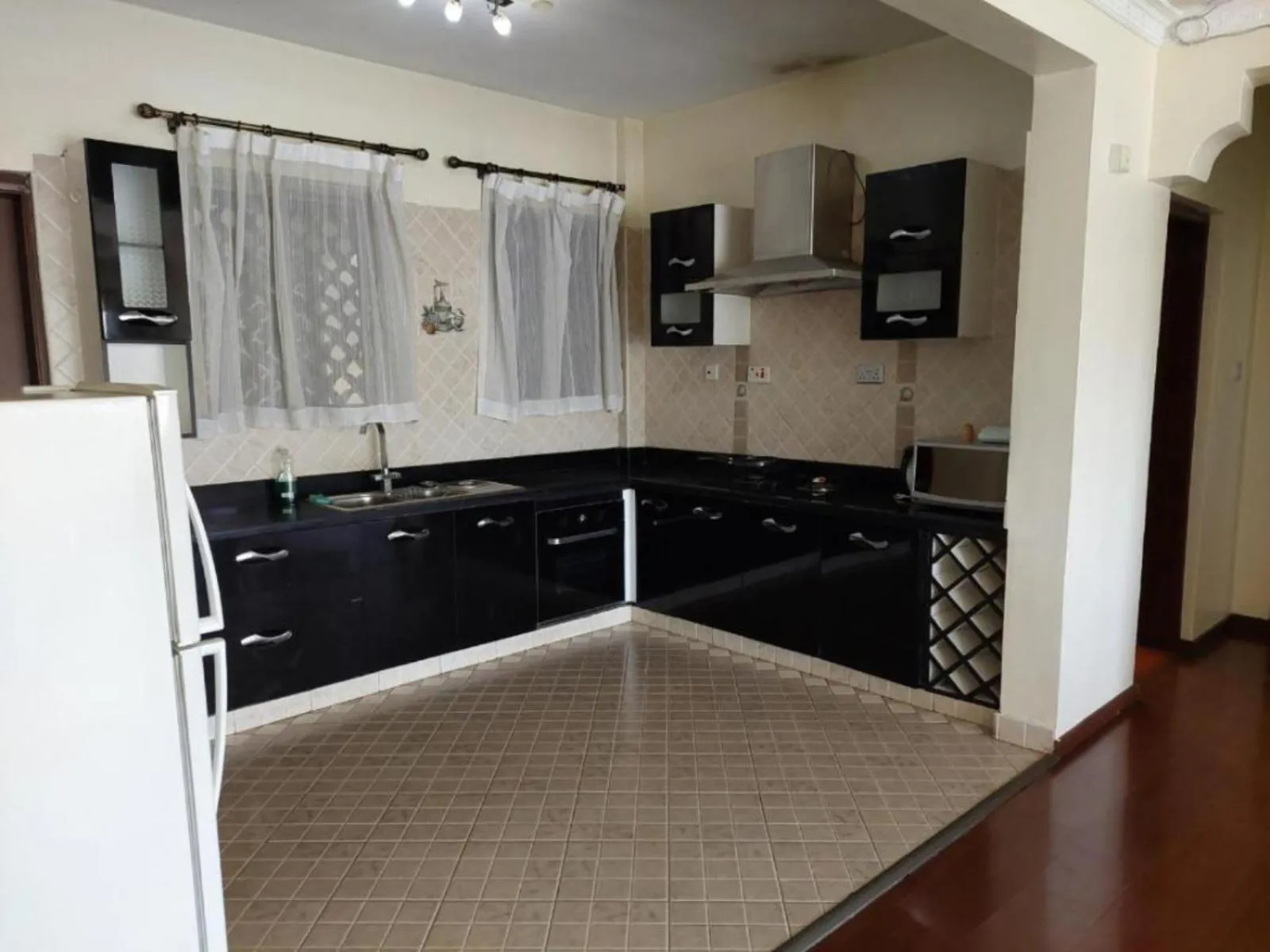 Kitchen or kitchenette in Eldon Apartments & Suites