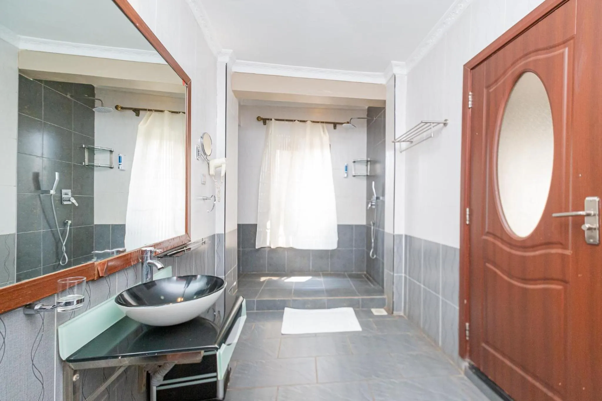 Shower in Eldon Apartments & Suites