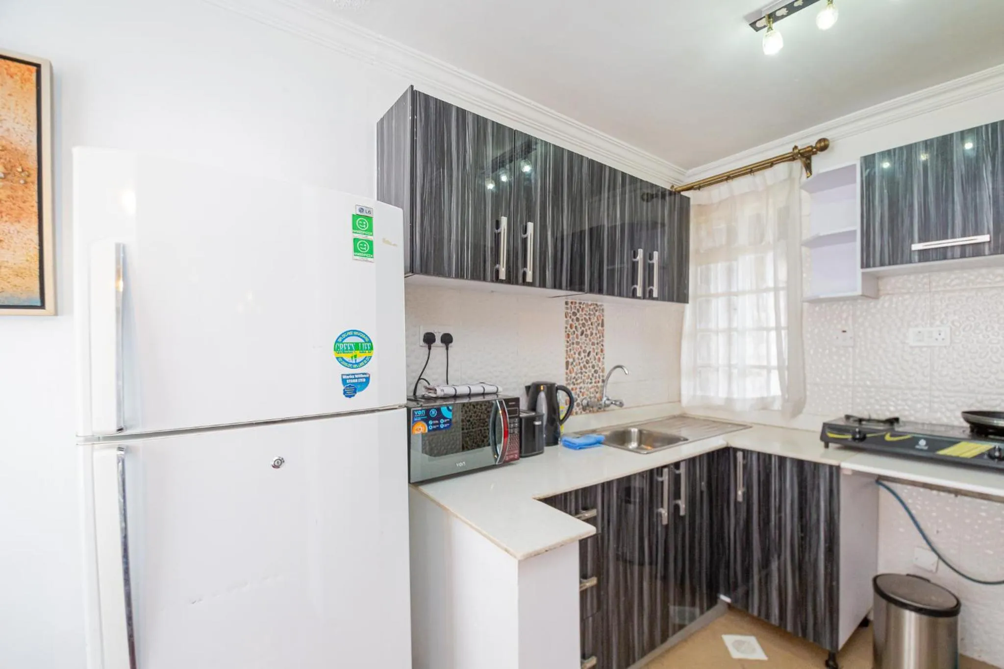 Kitchen or kitchenette in Eldon Apartments & Suites