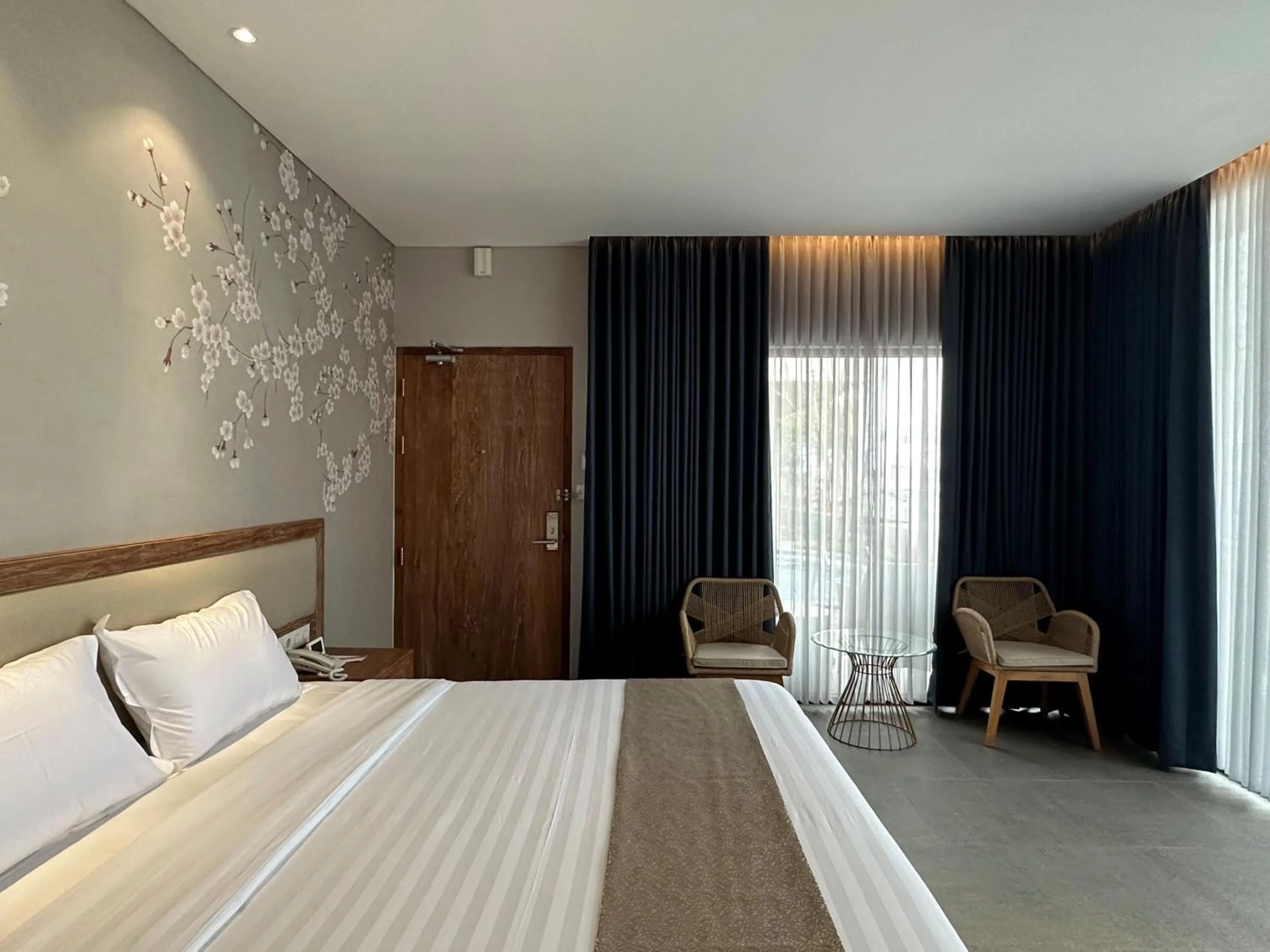 Bed in Tabebuya Resto & Resort