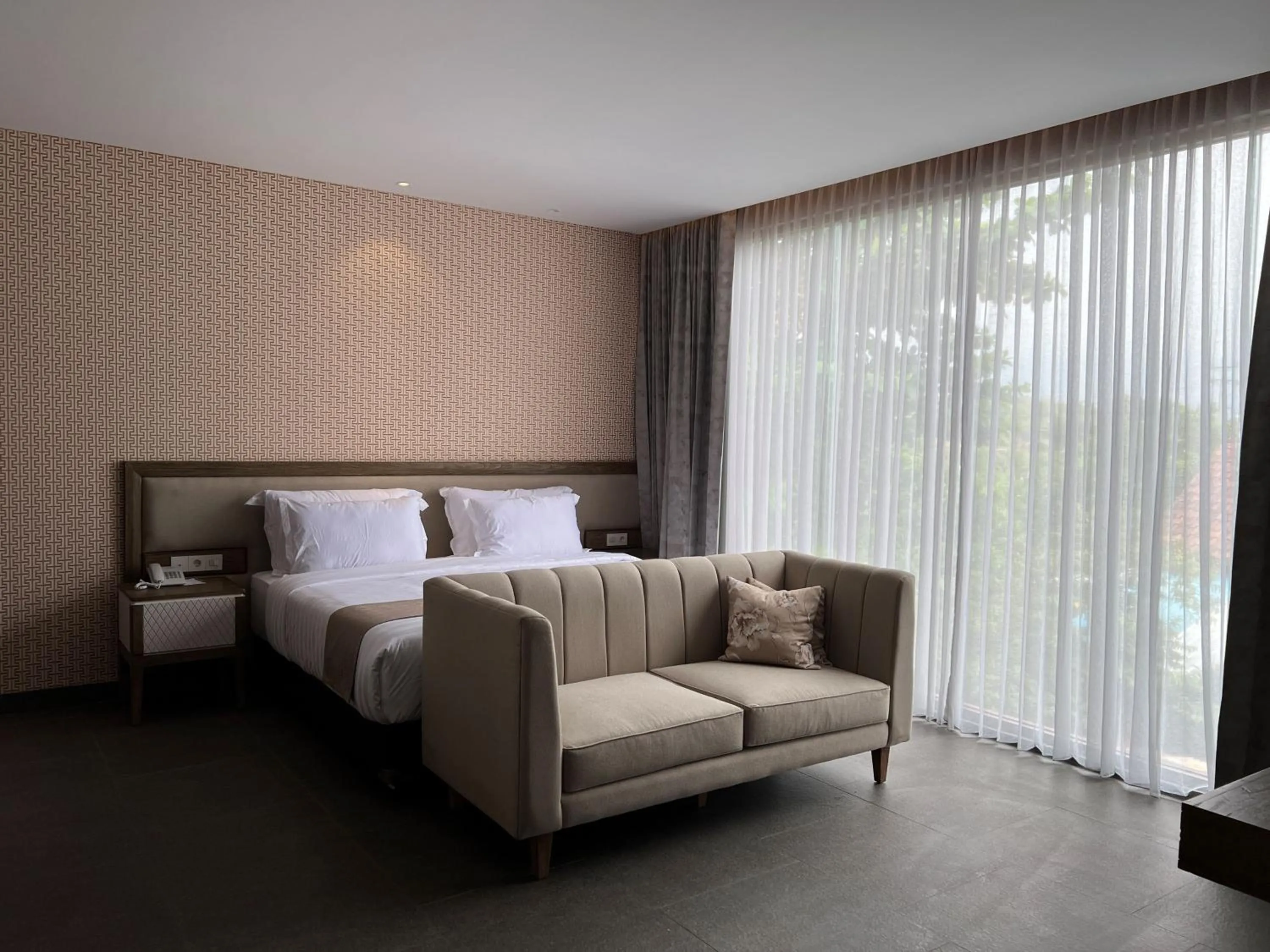 Bed in Tabebuya Resto & Resort