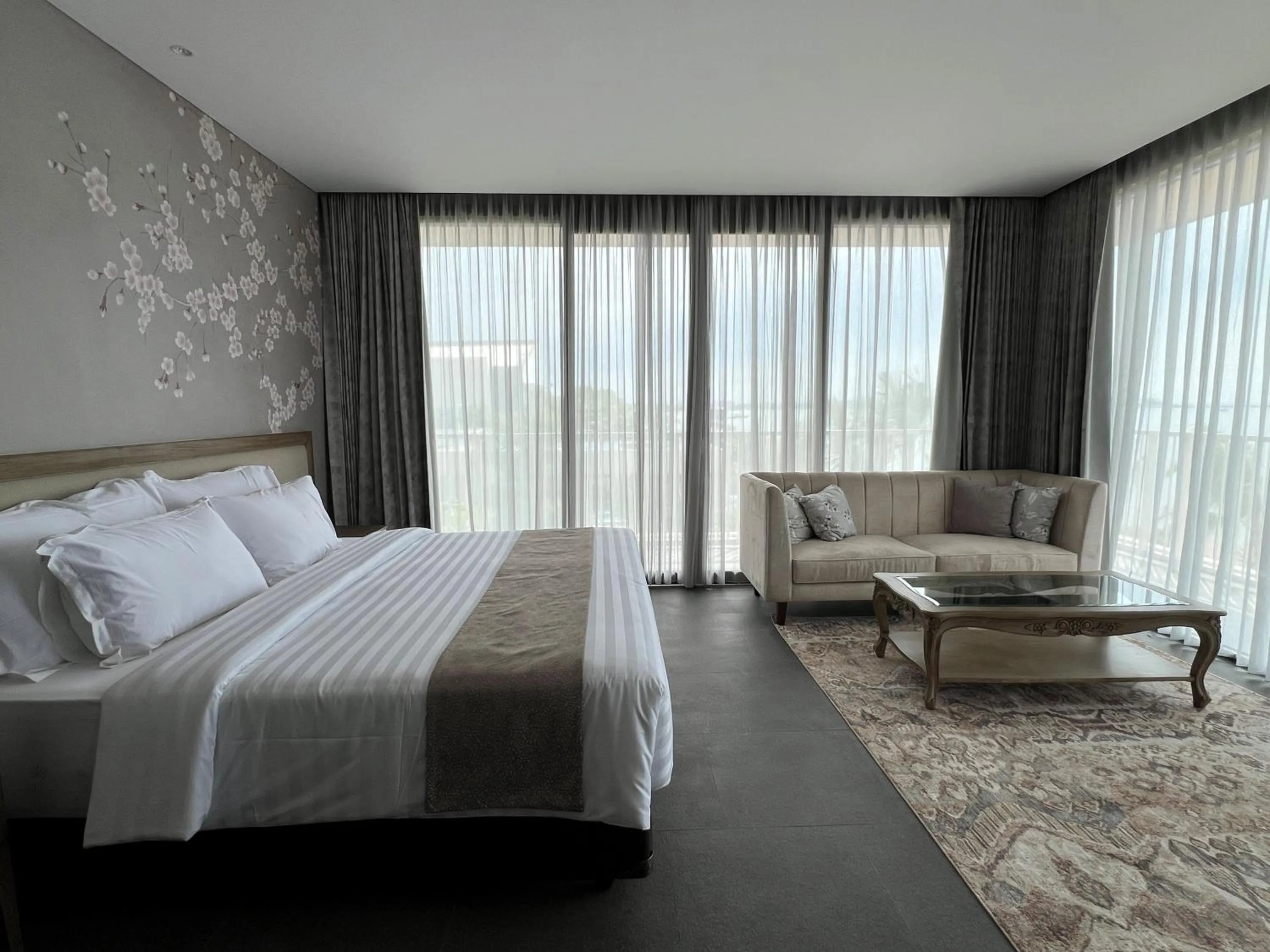 Bed in Tabebuya Resto & Resort