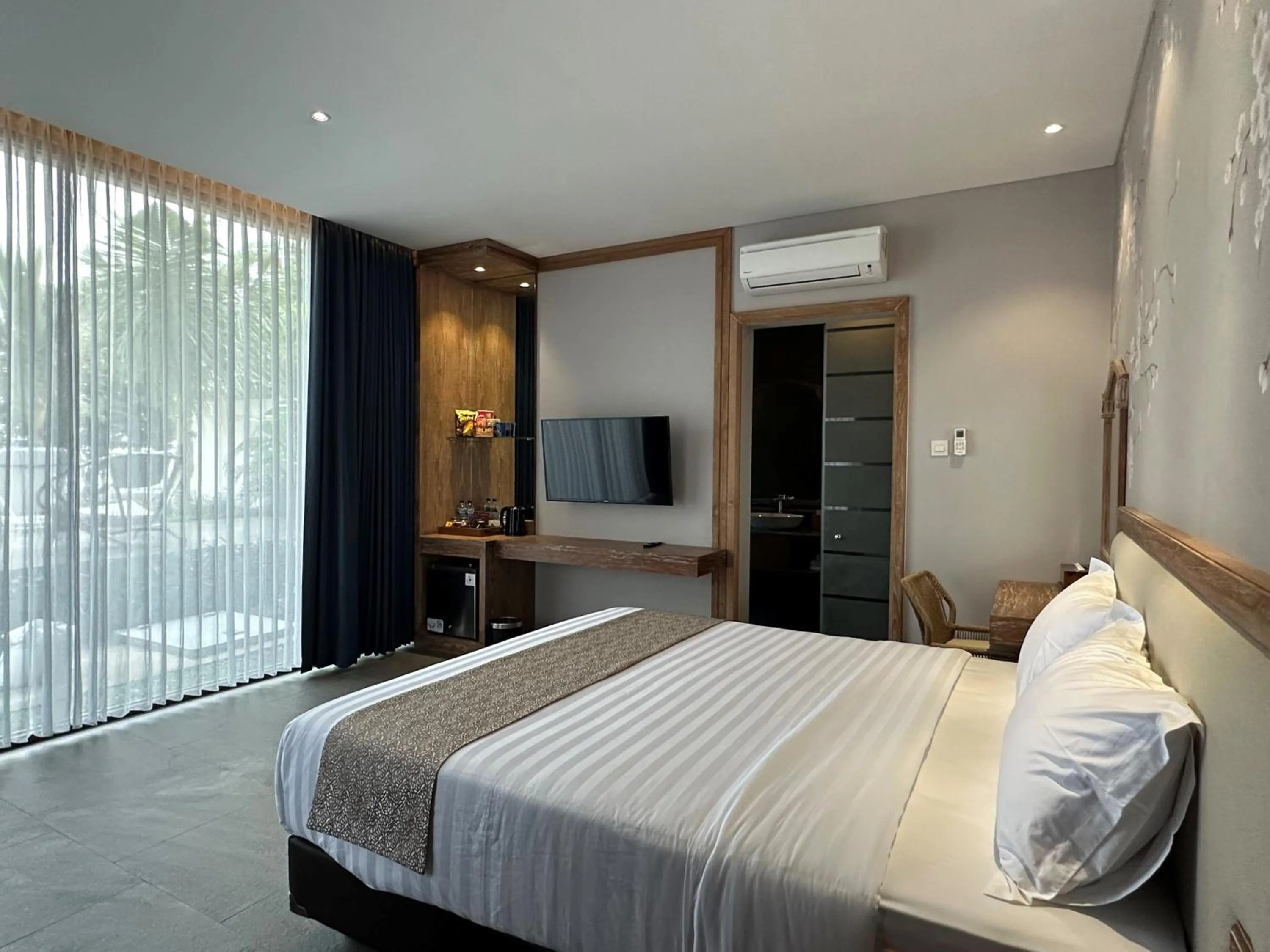 Bed in Tabebuya Resto & Resort