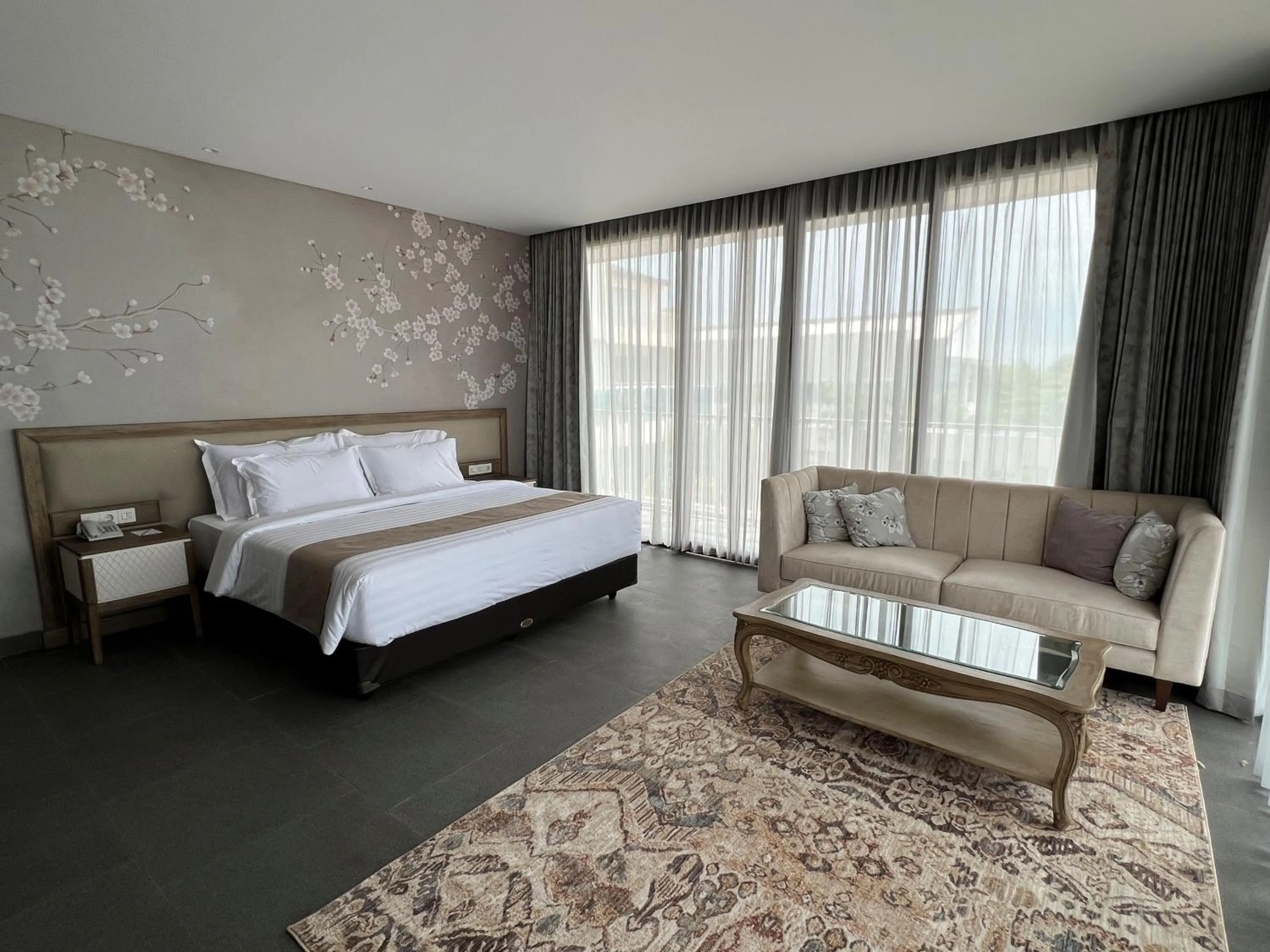 Bed in Tabebuya Resto & Resort