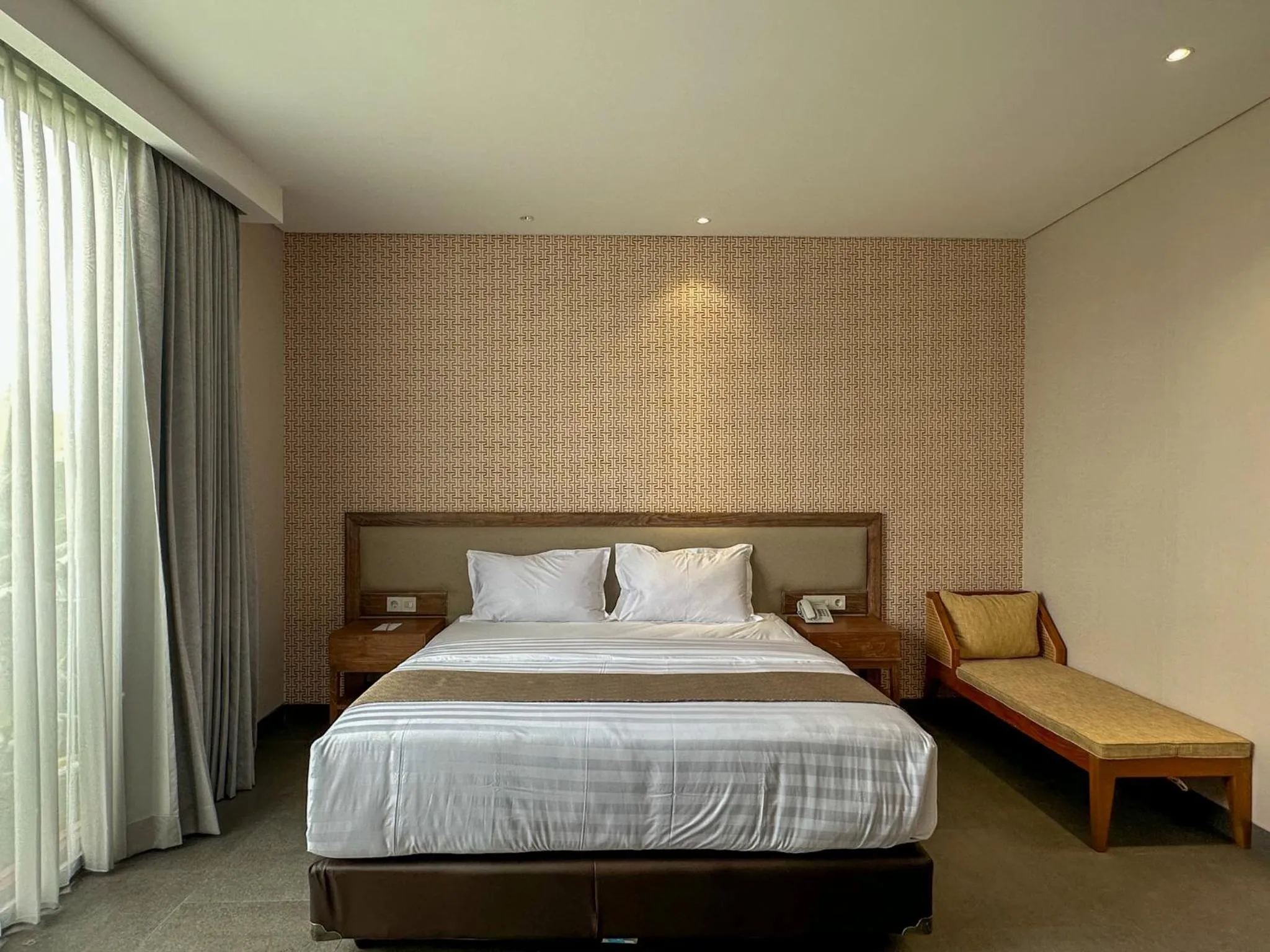 Bed in Tabebuya Resto & Resort