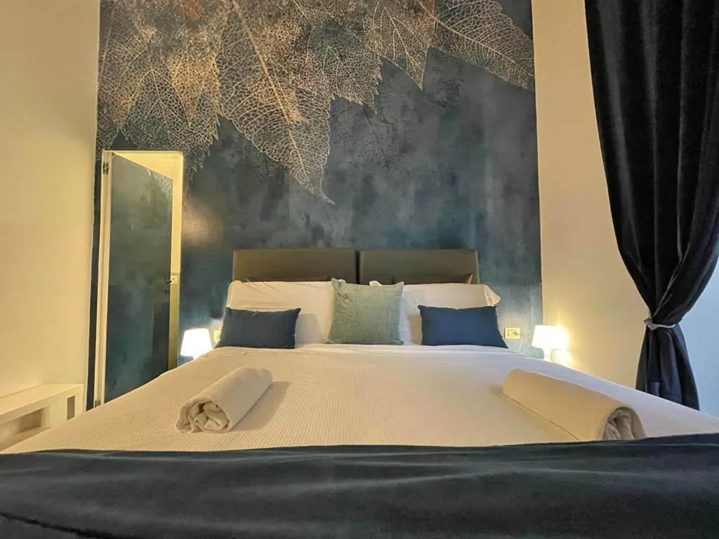 Bed in Happy Family Apartments Sauli