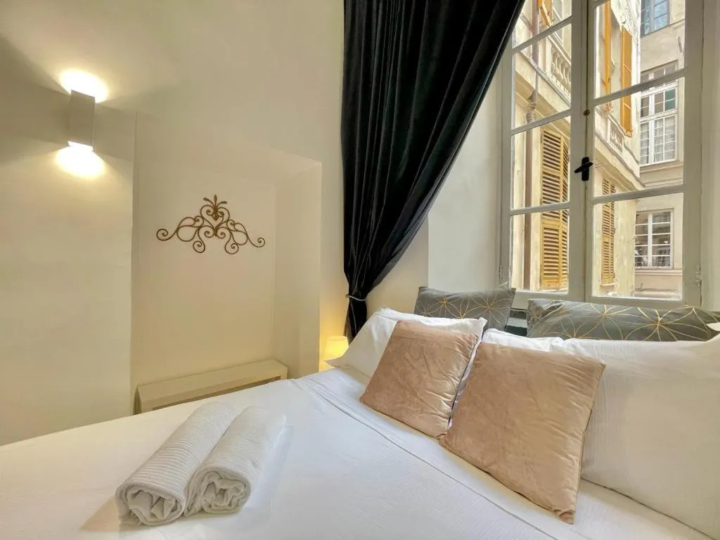 Bed in Happy Family Apartments Sauli